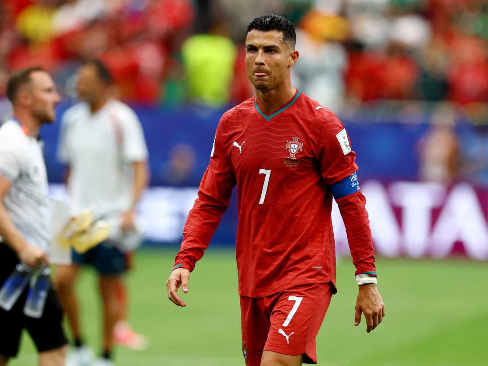 Portugal's Cristiano Ronaldo looks dejected as he walks off the pitch after the match against DR Congo. (Photo/Reuters)