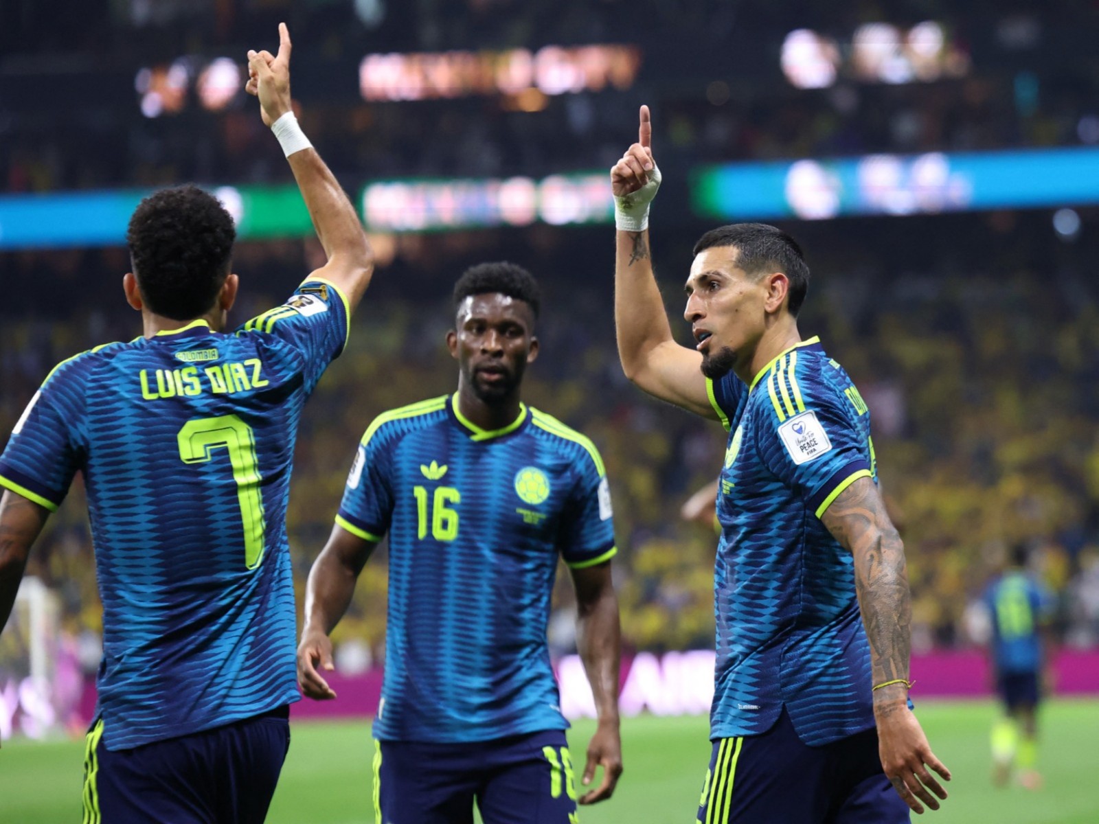 Colombia's Daniel Munoz celebrates scoring their first goal with Luis Diaz. (Photo: Reuters)