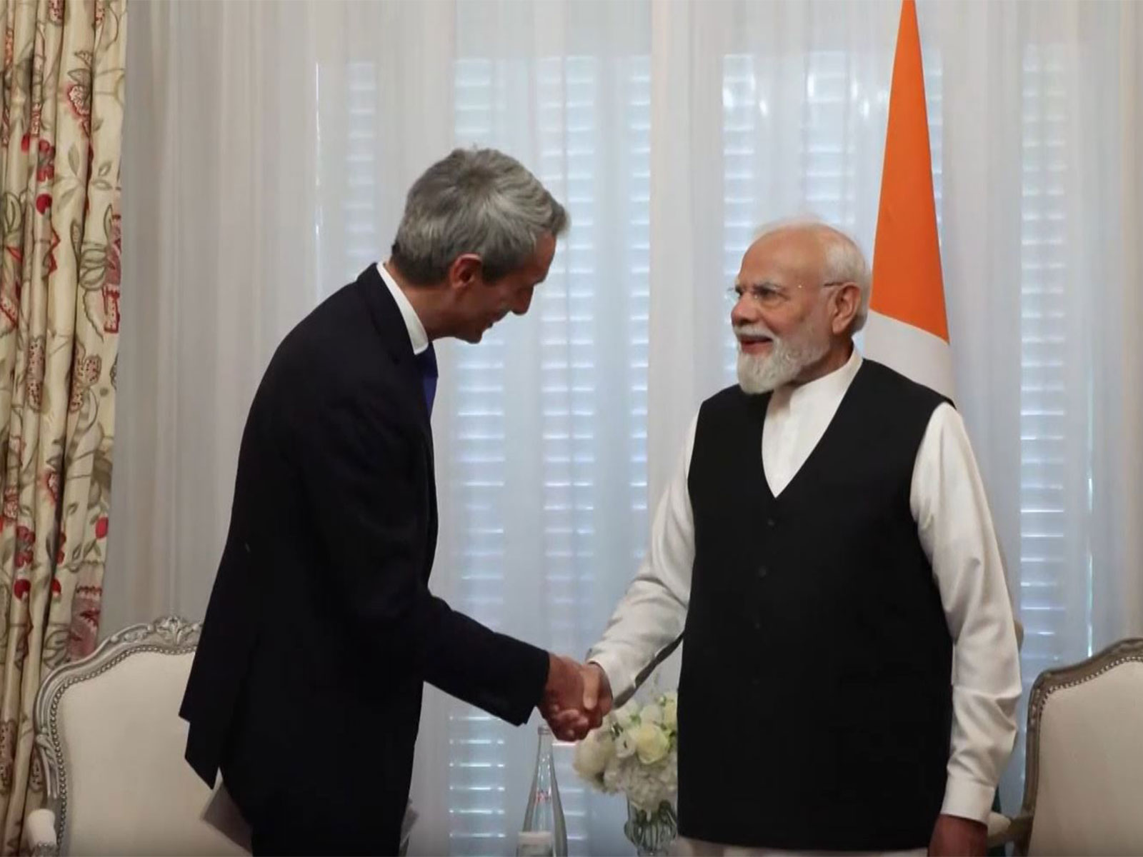 Prime Minister Narendra Modi meets Saint-Gobain Chairman and CEO Benoit Bazin during his visit to Paris, France (Photo/ANI) 
