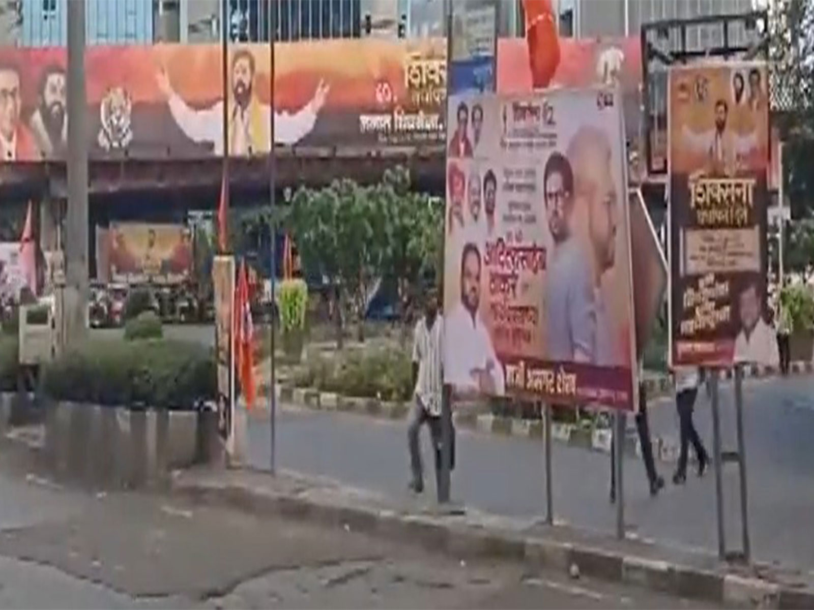 Posters of both Shiv Sena factions adorn Mumbai as the party marks its foundation day amid political speculation over "Operation Tiger." (Photo/ANI)
