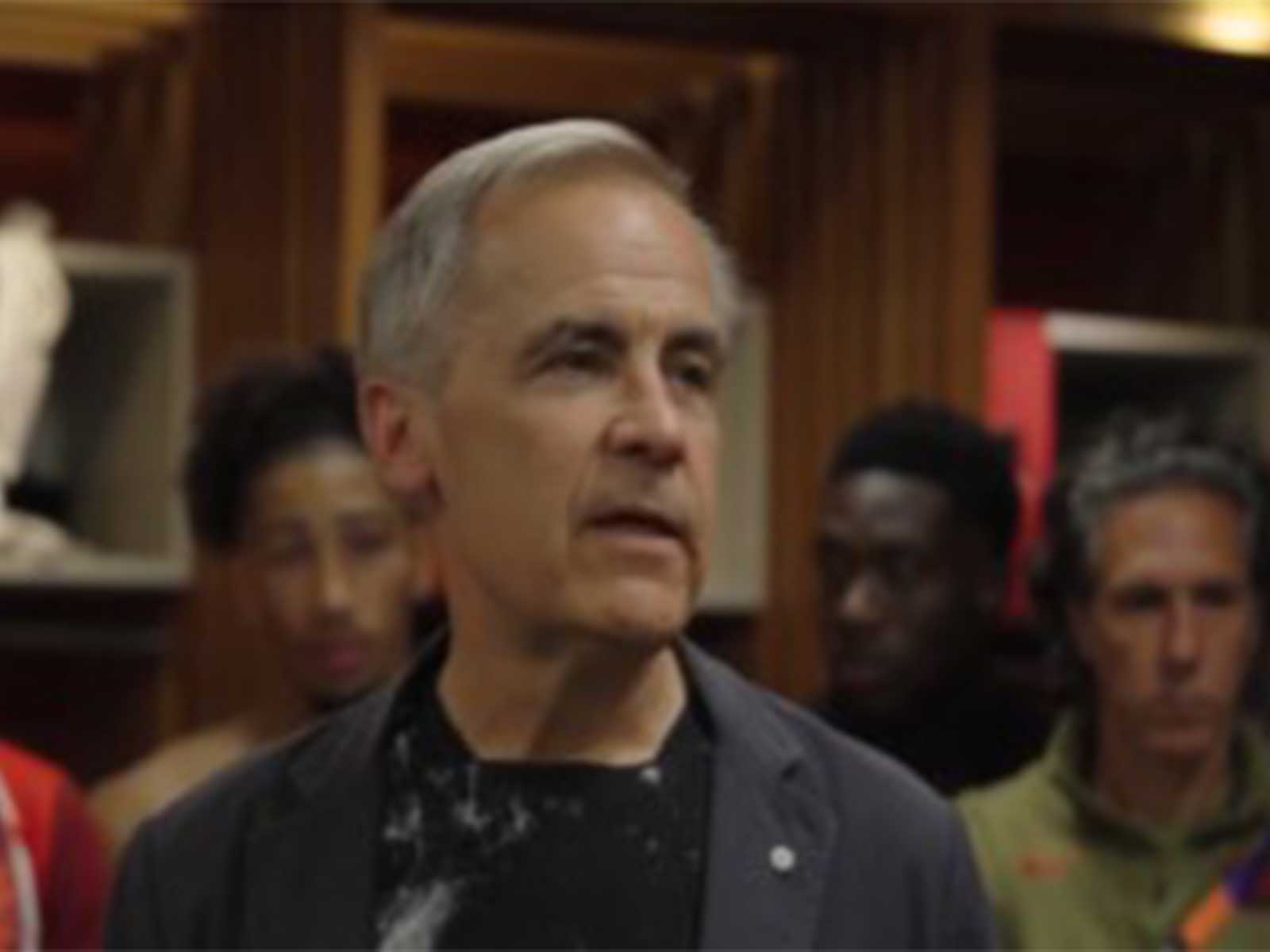 Canada PM Mark Carney with Canada football team players. (Photo: Screengrab from X/@CANMNT_Official)