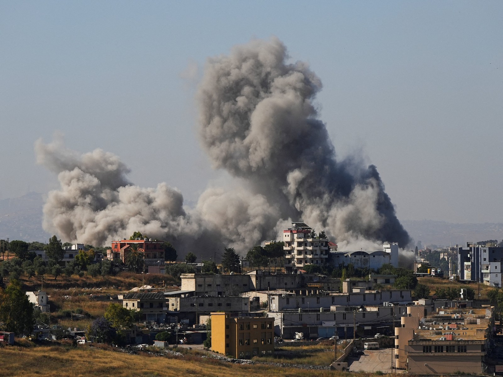 Smoke billows from southern Lebanon following an Israeli strike, as seen from Nabatieh (Photo/Reuters)
