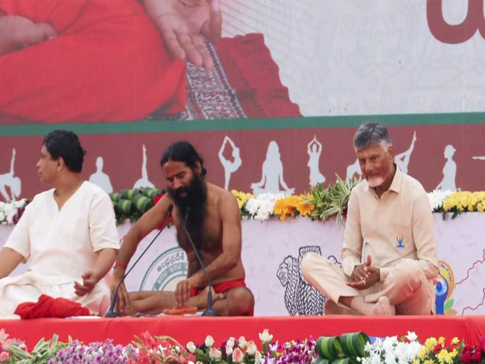 AP CM Chandrababu Naidu, Yoga Guru Baba Ramdev pariticpate in Yoga Day Celebrations (Photo/ANI) 
