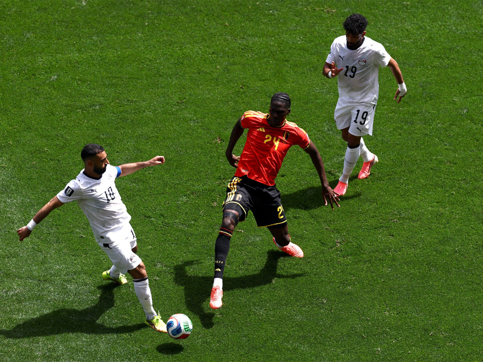 Football - FIFA World Cup 2026 - Group G - Belgium v Egypt - Seattle Stadium, Seattle, Washington, U.S. - June 15, 2026 Egypt's Mohamed Salah in action with Belgium's Amadou Onana. (Photo/Reuters)