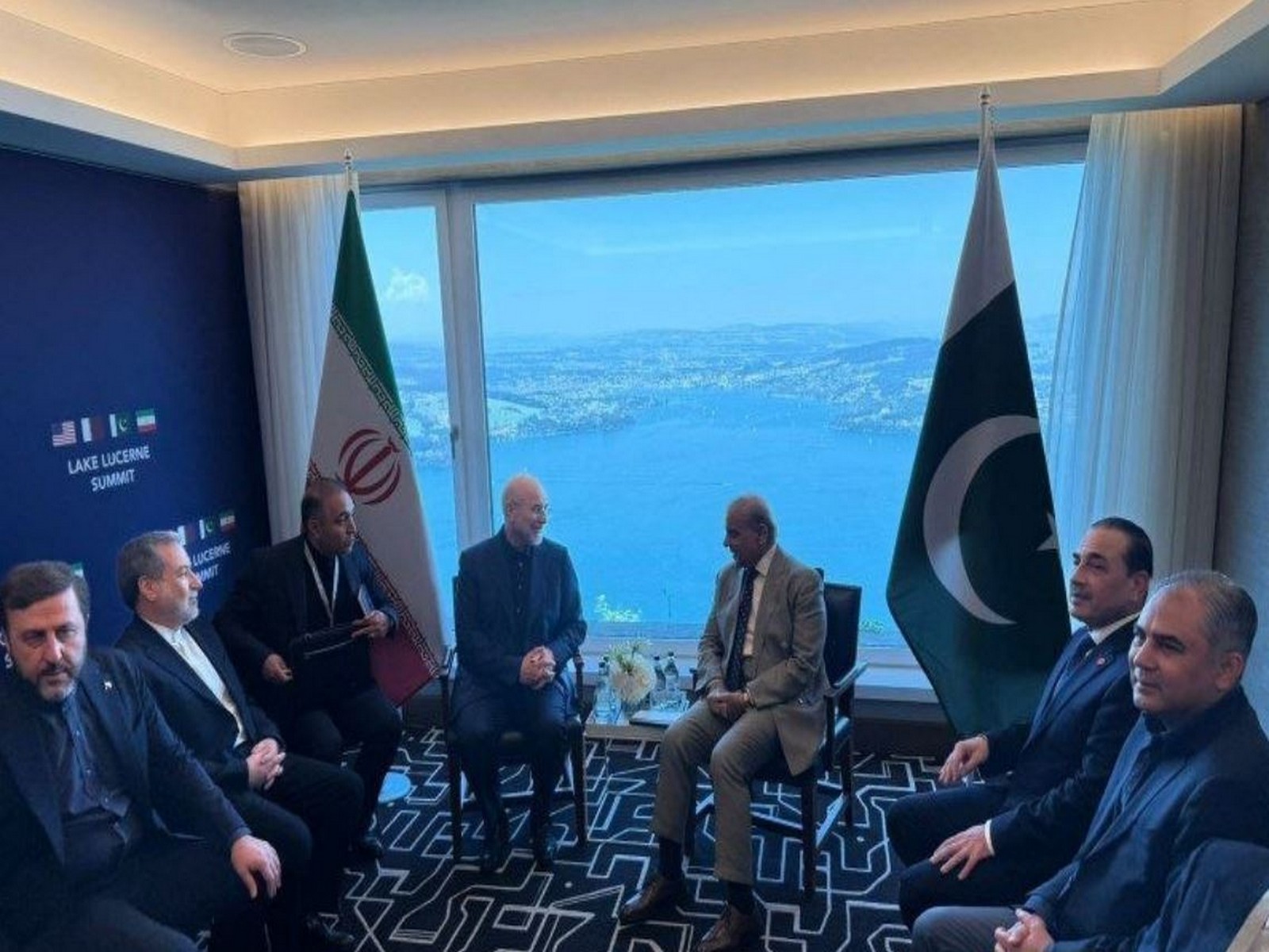 Iranian Parliament Speaker Mohammad Bagher Ghalibaf and Pakistan Prime Minister Shehbaz Sharif meet on the sidelines of US-Iran negotiations in Burgenstock, Switzerland. (Image Source: Iranian state media)