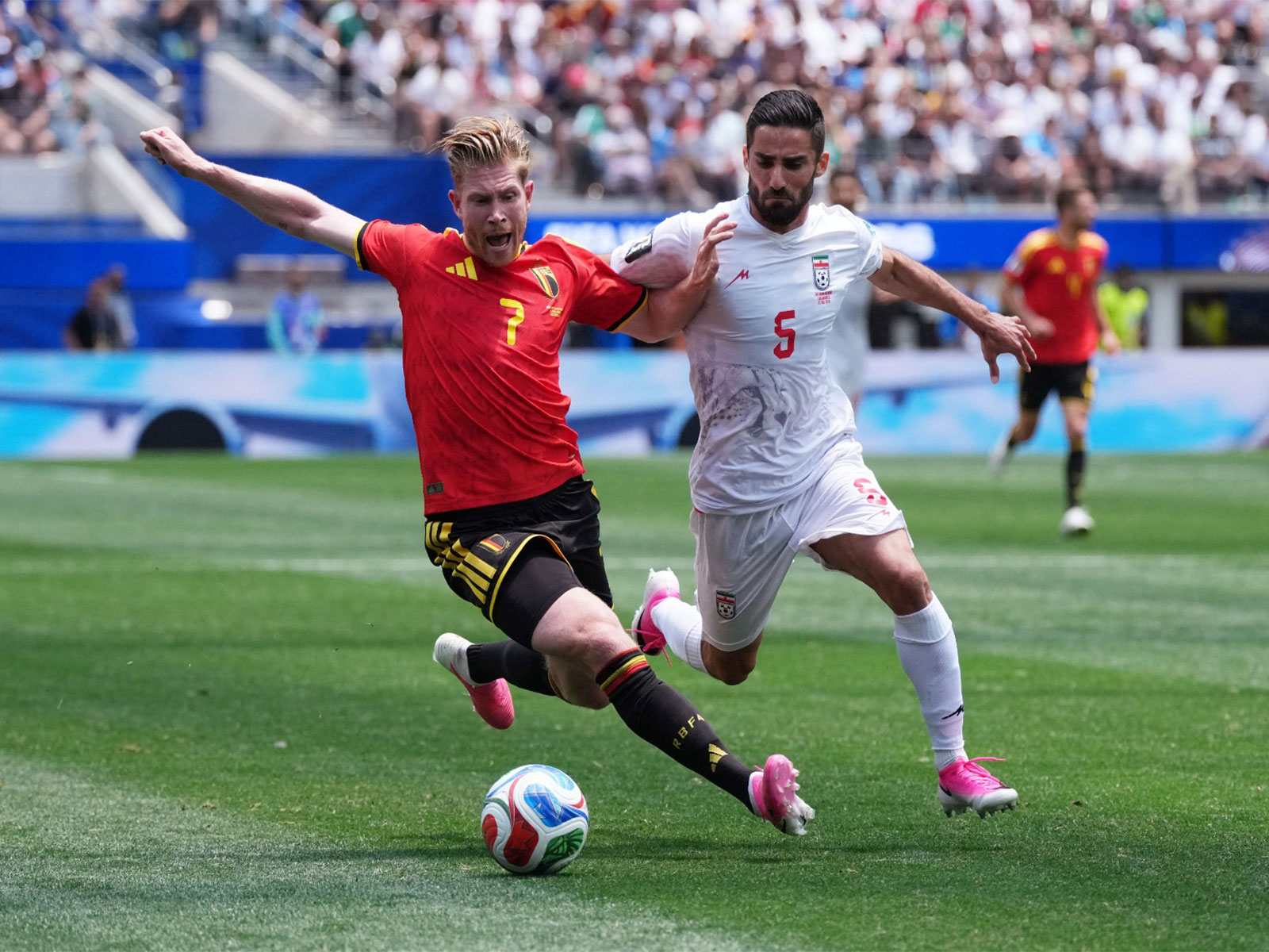 Belgium's Kevin De Bruyne and Iran's Milad Mohammadi in action during the World Cup match. (Photo: IMAGN IMAGES via Reuters)