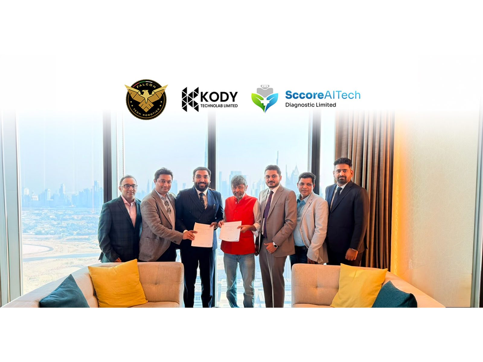 Signed agreement exchanged between leaders of Kody Technolab Limited, Falcon Tech Robotics & Sccore AI Tech in Dubai, UAE