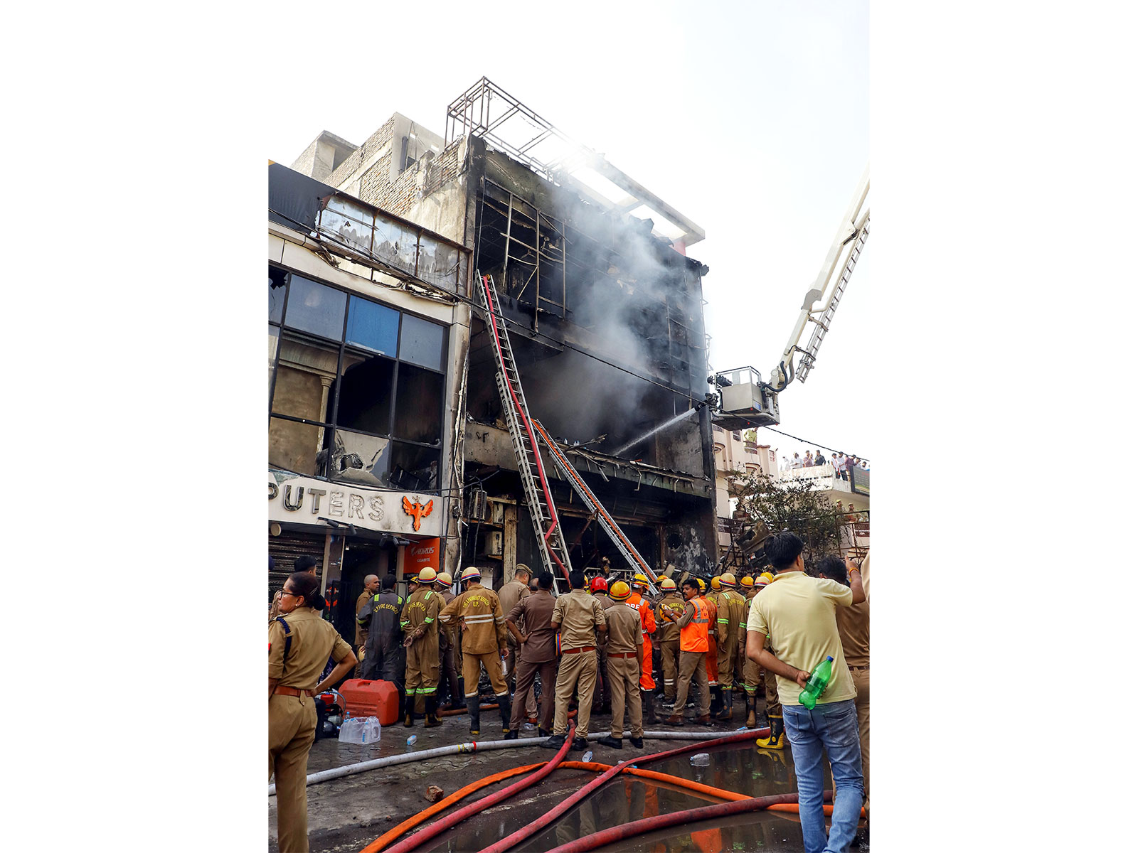 A fire broke out at a commercial building in Aliganj area of Lucknow (Photo/ANI)