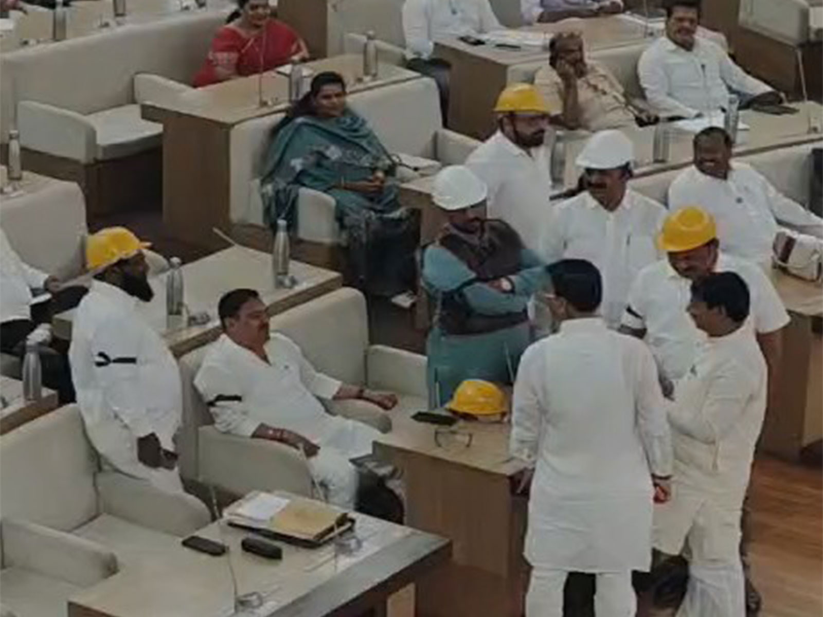Corporators wear helmets in PMC House (Photo/PuneCongress)