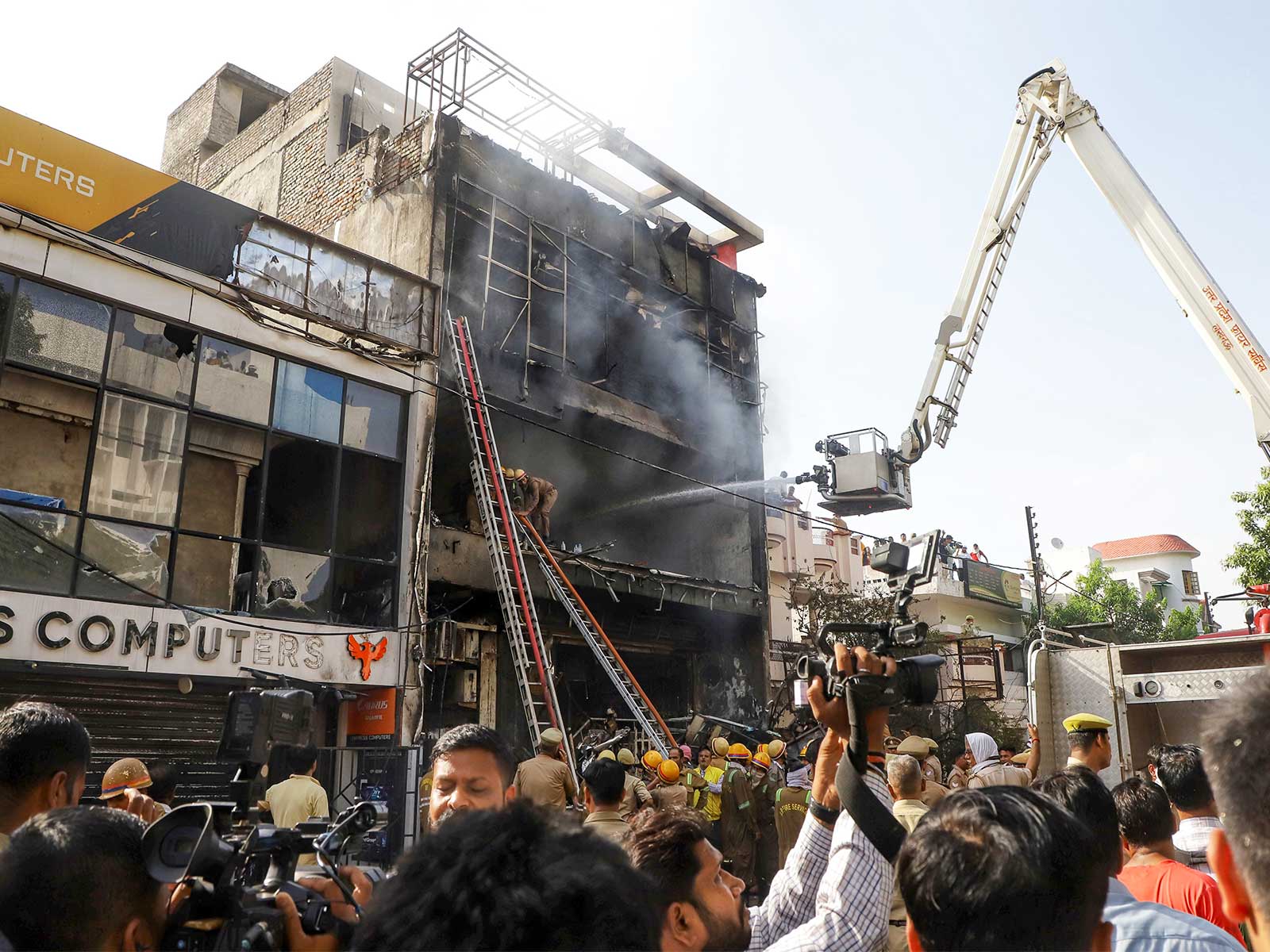 Firefighters conducting rescue and relief operations at the incident site in Lucknow (Photo/ANI)