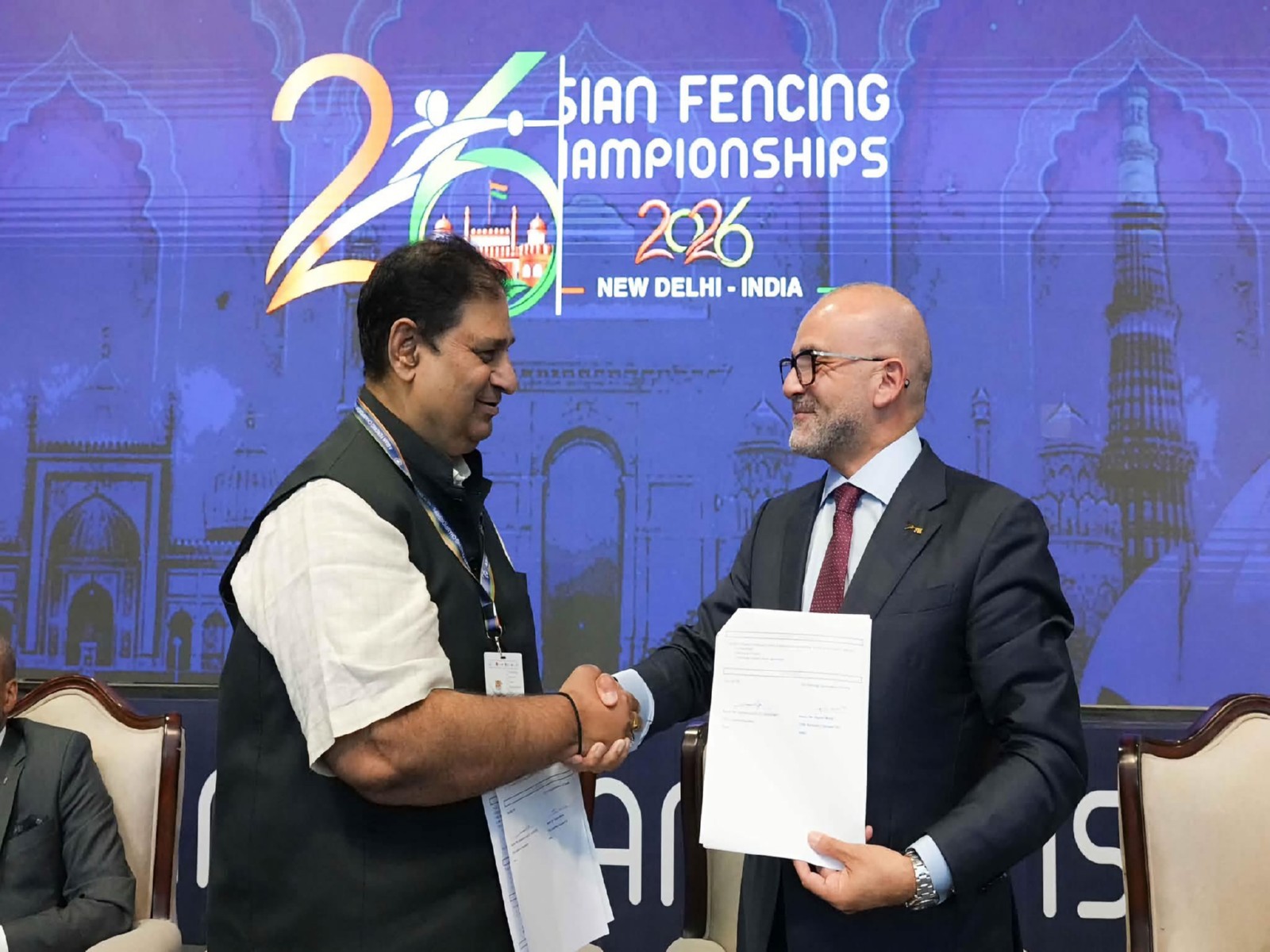 Interim President of International Fencing Federation Abdelmoniem El Husseiny and Secretary General of Fencing Association of India Rajeev Mehta during the signing of MoU (Image: FAI)