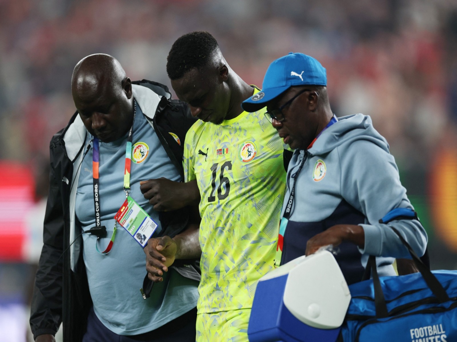 Senegal's Edouard Mendy walks off the pitch with medical staff after sustaining an injury against Norway (Photo: Reuters)