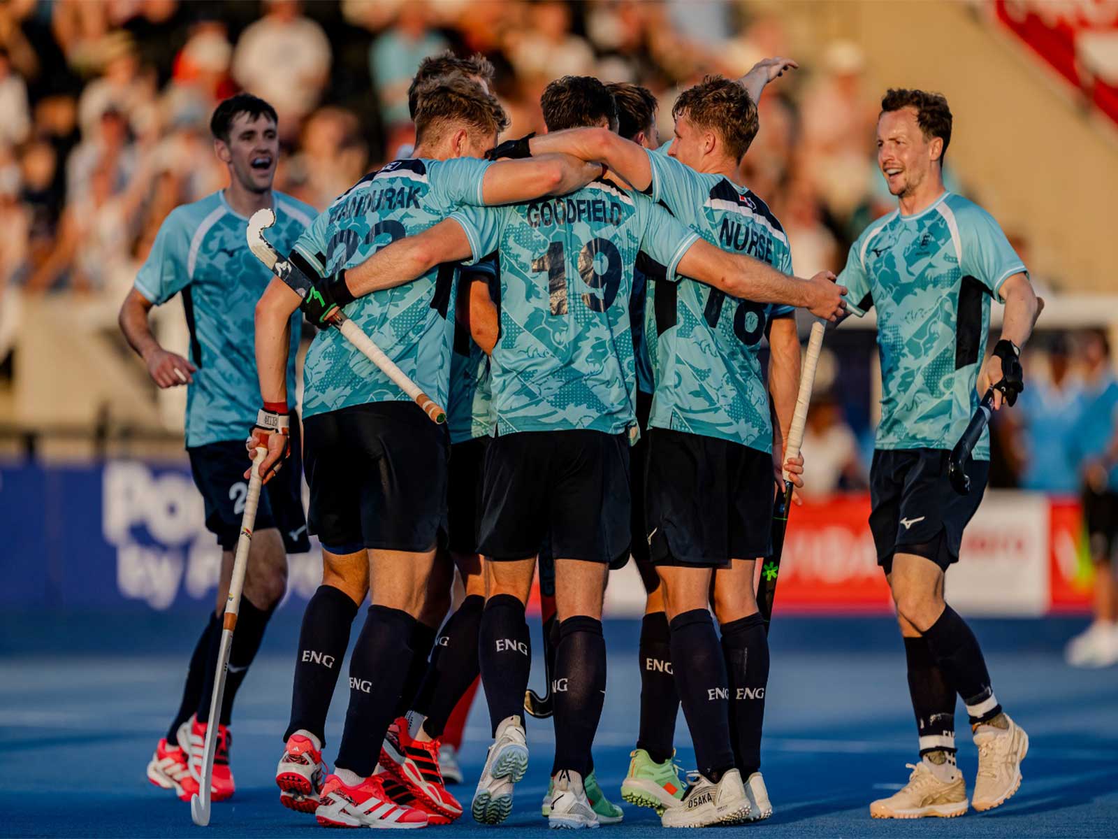 England players celebrating in hurdle (Photo: Hockey India)