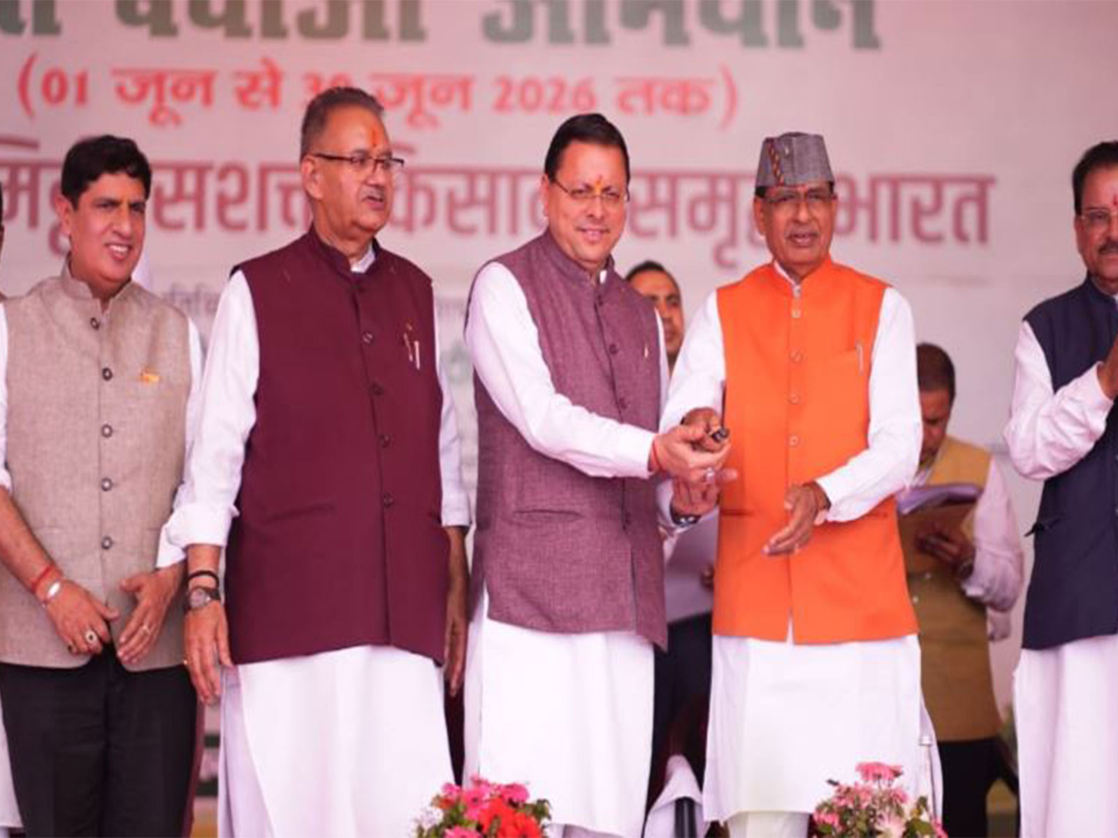 Union Minister Shivraj Singh Chouhan and Uttarakhand Chief Minister Pushkar Singh Dhami (Photo/ANI)
