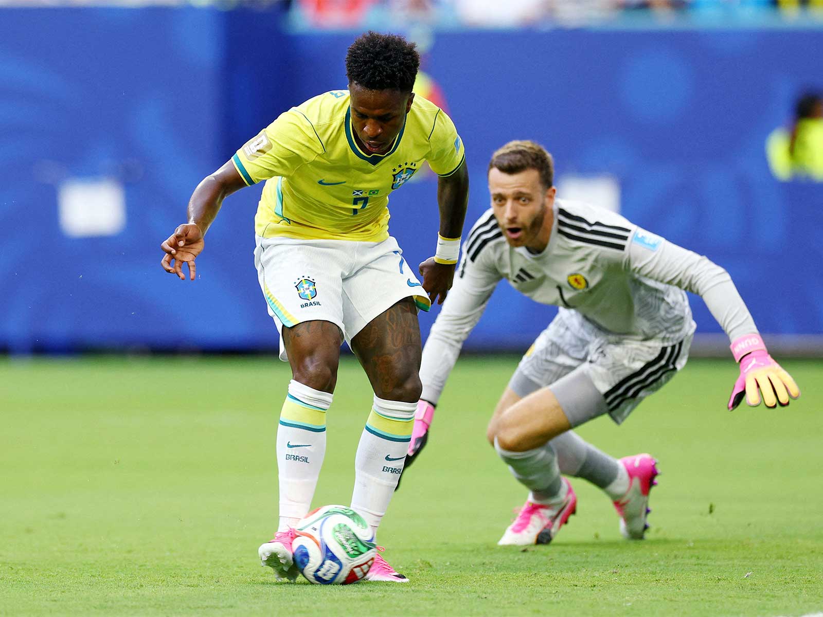 Soccer Football - FIFA World Cup 2026 - Group C - Scotland v Brazil - Miami Stadium, Miami Gardens, Florida, U.S. - June 24, 2026 Brazil's Vinicius Junior scores their first goal past Scotland's Angus Gunn. (Photo: IMAGN IMAGES via Reuters/Nathan Ray