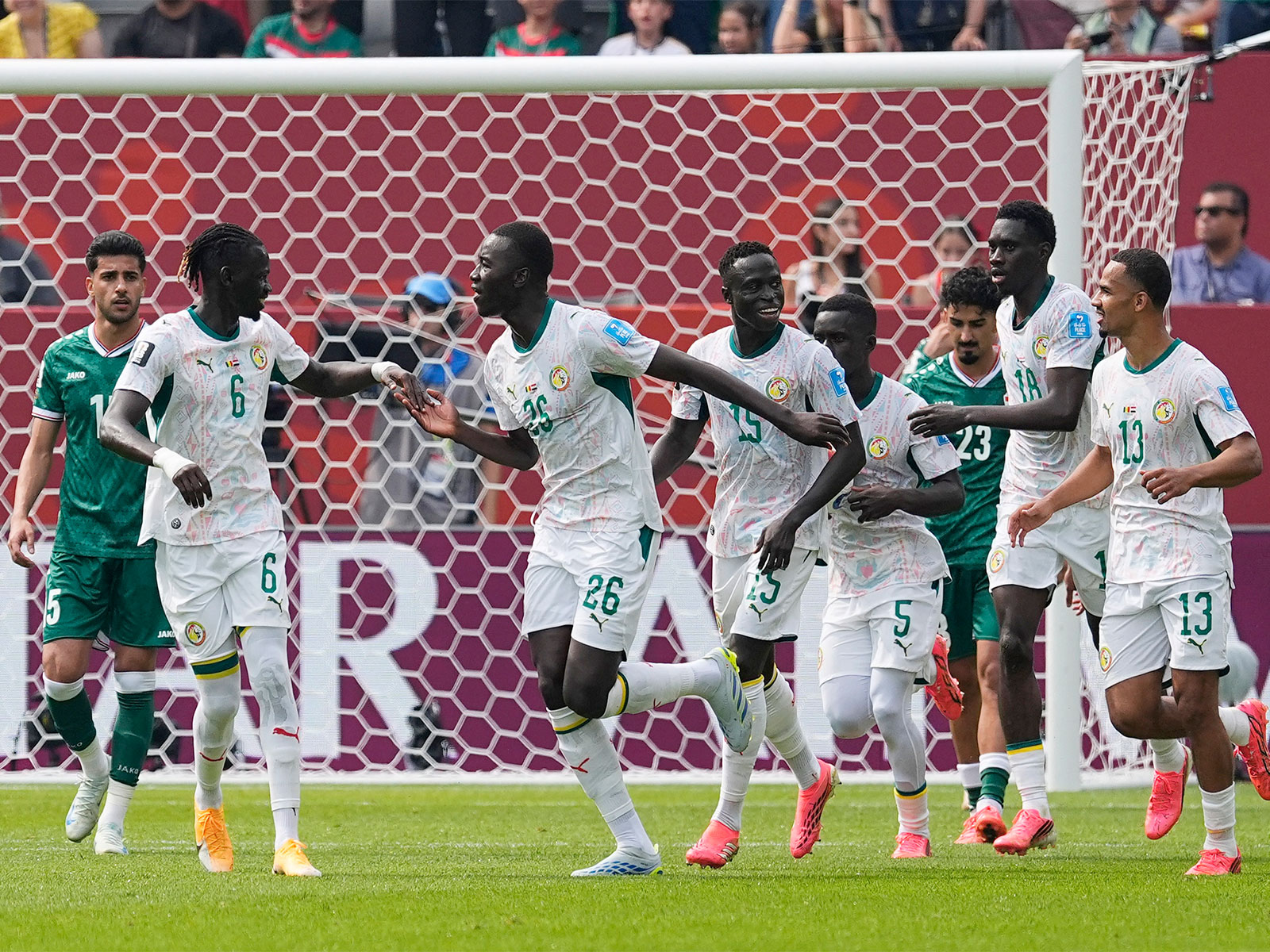 Senegal's Pape Gueye celebrates scoring their fourth goal with teammates. (Photo: IMAGN IMAGES via Reuters)