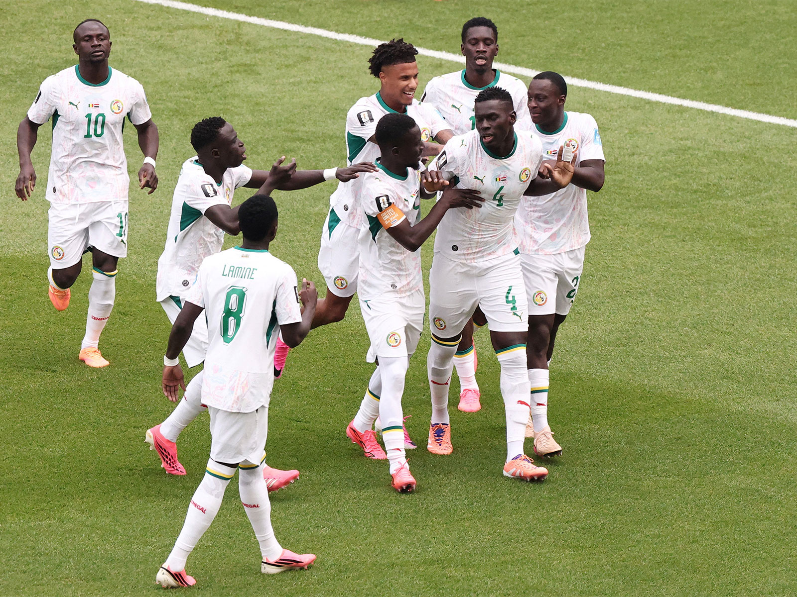 Senegal's Abdoulaye Seck celebrates scoring their first goal with teammates. (Photo/Reuters)