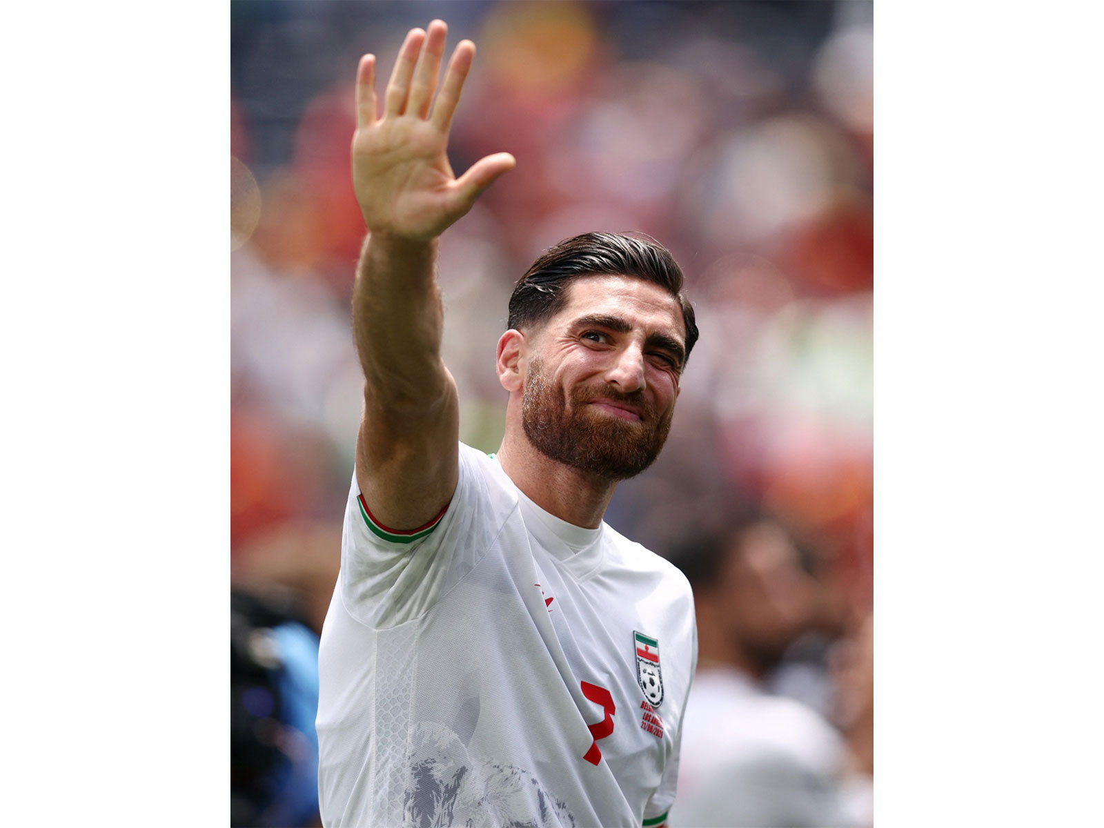 Iran's Alireza Jahanbakhsh applauds fans after the match against Belgium. (Photo: IMAGN IMAGES via Reuters)