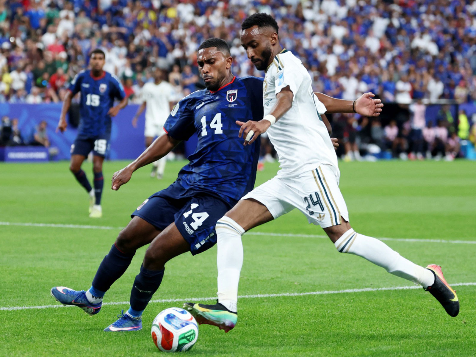 Cabo Verde's Deroy Duarte in action with Saudi Arabia's Moteb Al-Harbi. (Photo: IMAGN IMAGES via Reuters)