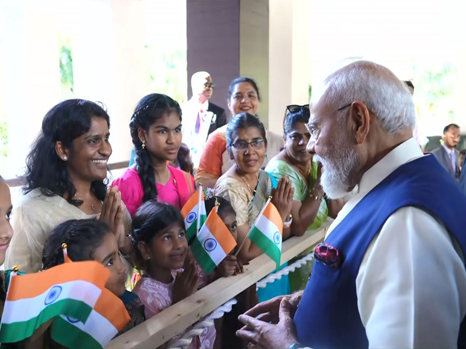 Prime Minister Narendra Modi receives warm welcome from Indian diaspora upon his arrival at a hotel in Victoria during his three-day State Visit to Seychelles. (Image Source: ANI/DD)