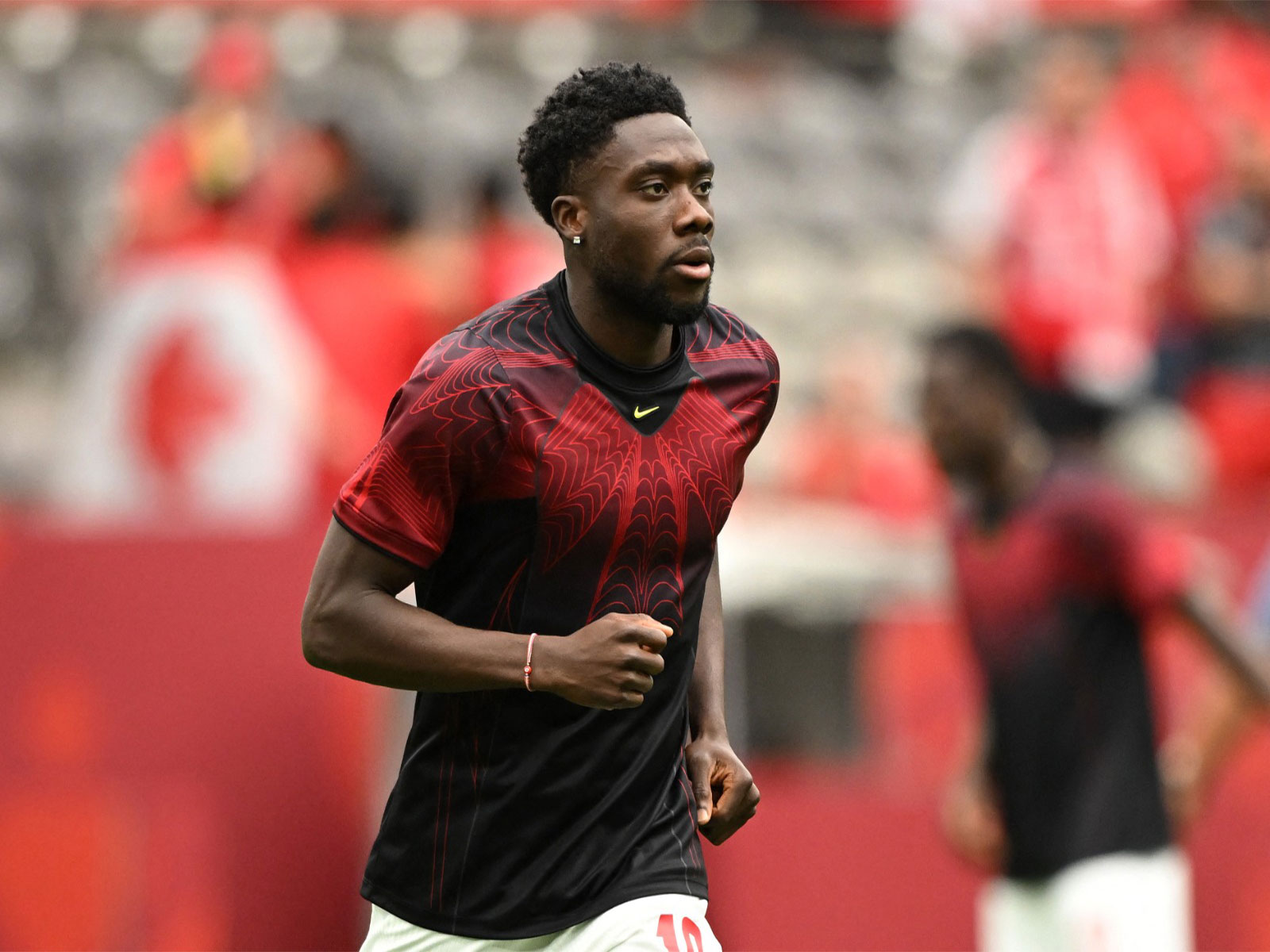 Canada's Alphonso Davies during the warm up before the match. (Photo/Imagn Images via Reuters)