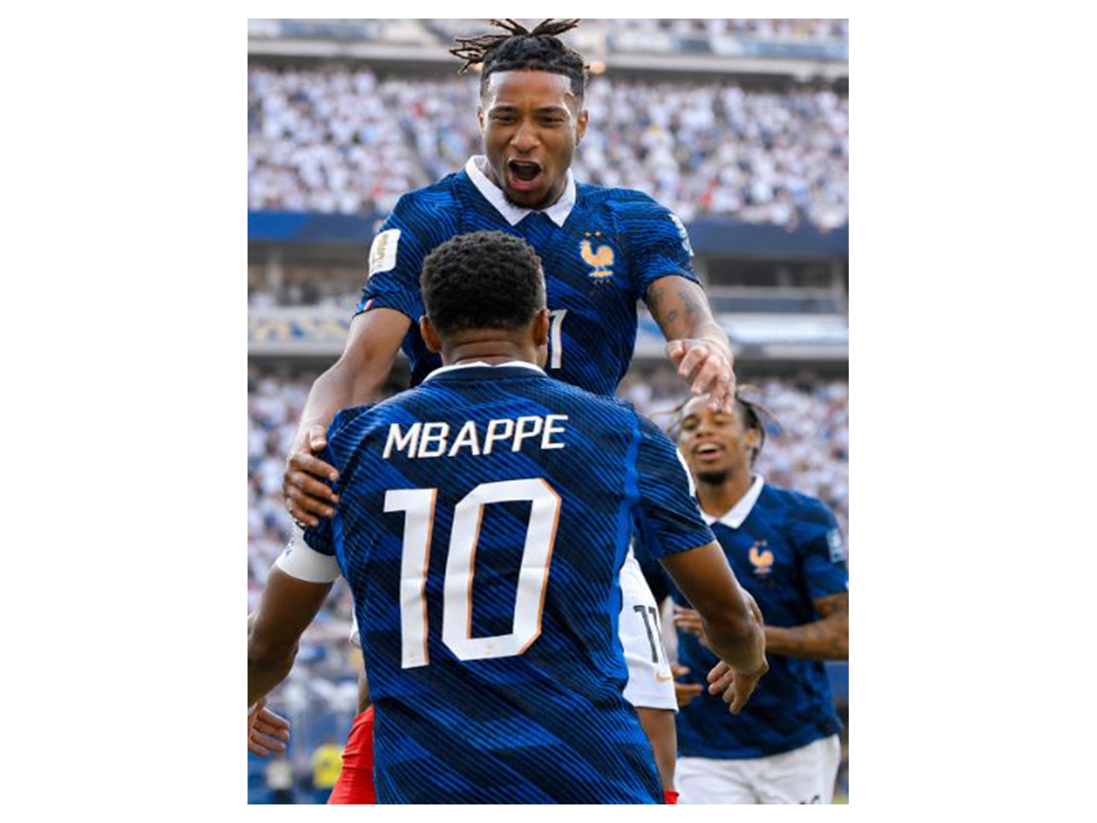 Michael Olise celebrating with Kylian Mbappe. (Photo: @equipedefrance X)