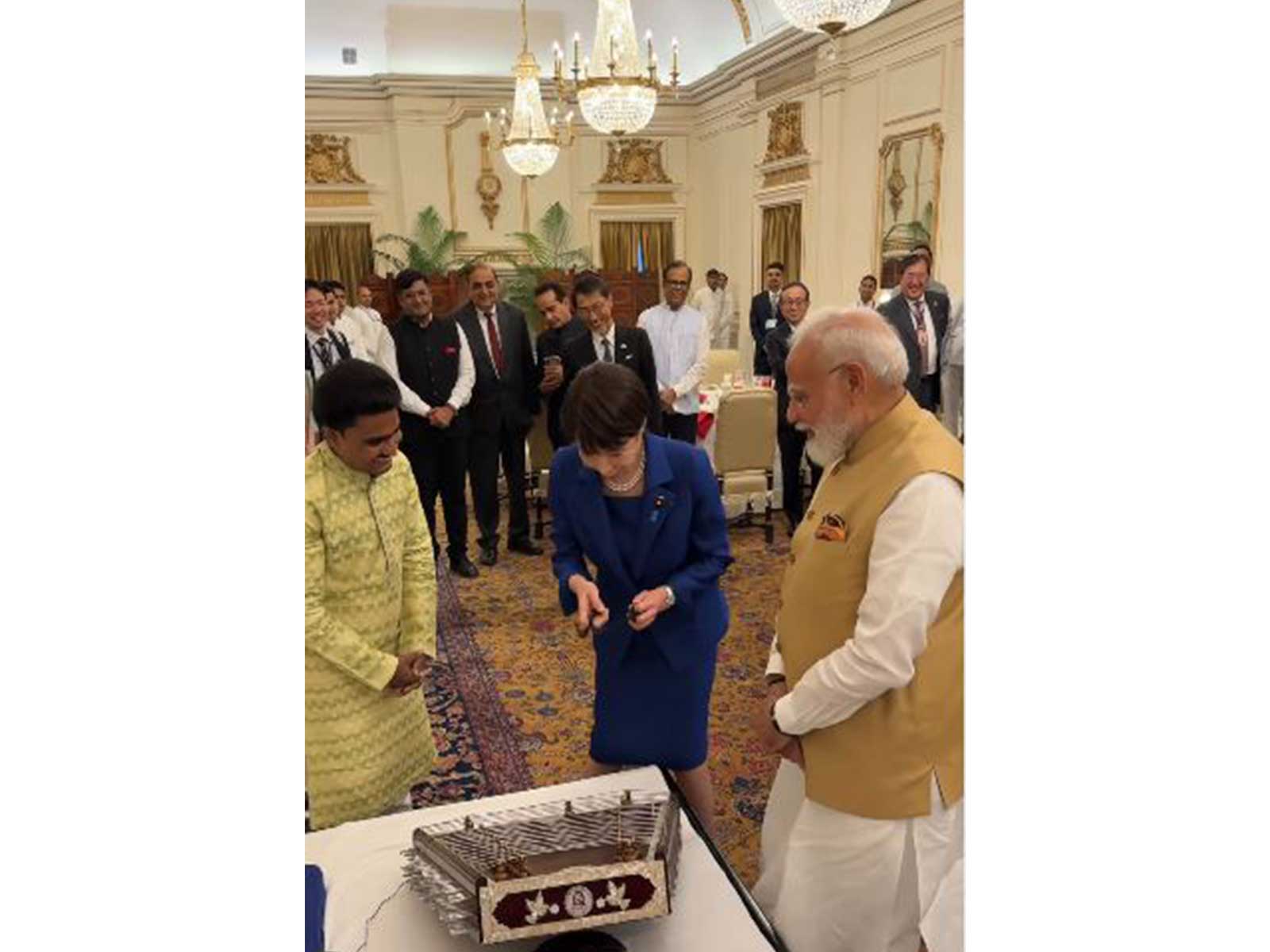 Japanese PM Sanae Takaichi attempts her hand at playing the santoor in New Delhi (Photo/Instagram/narendramodi) Inline photo/Instagram/@takaichi_sanae)