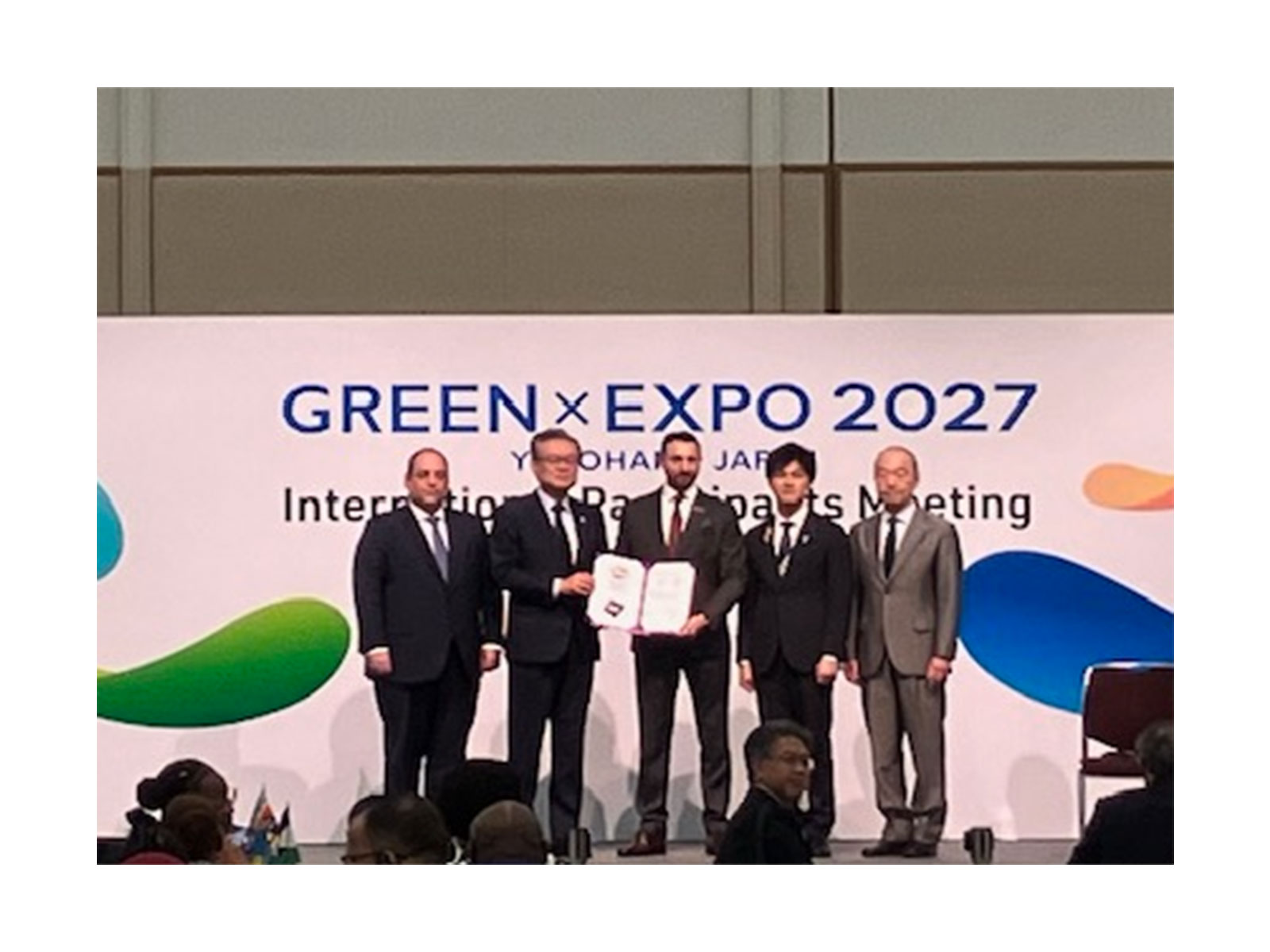 Officials pose for a group photograph during the International Participants Meeting for Green Expo 2027 in Yokohama, Japan. (Image Source: Indian Embassy in Tokyo) 