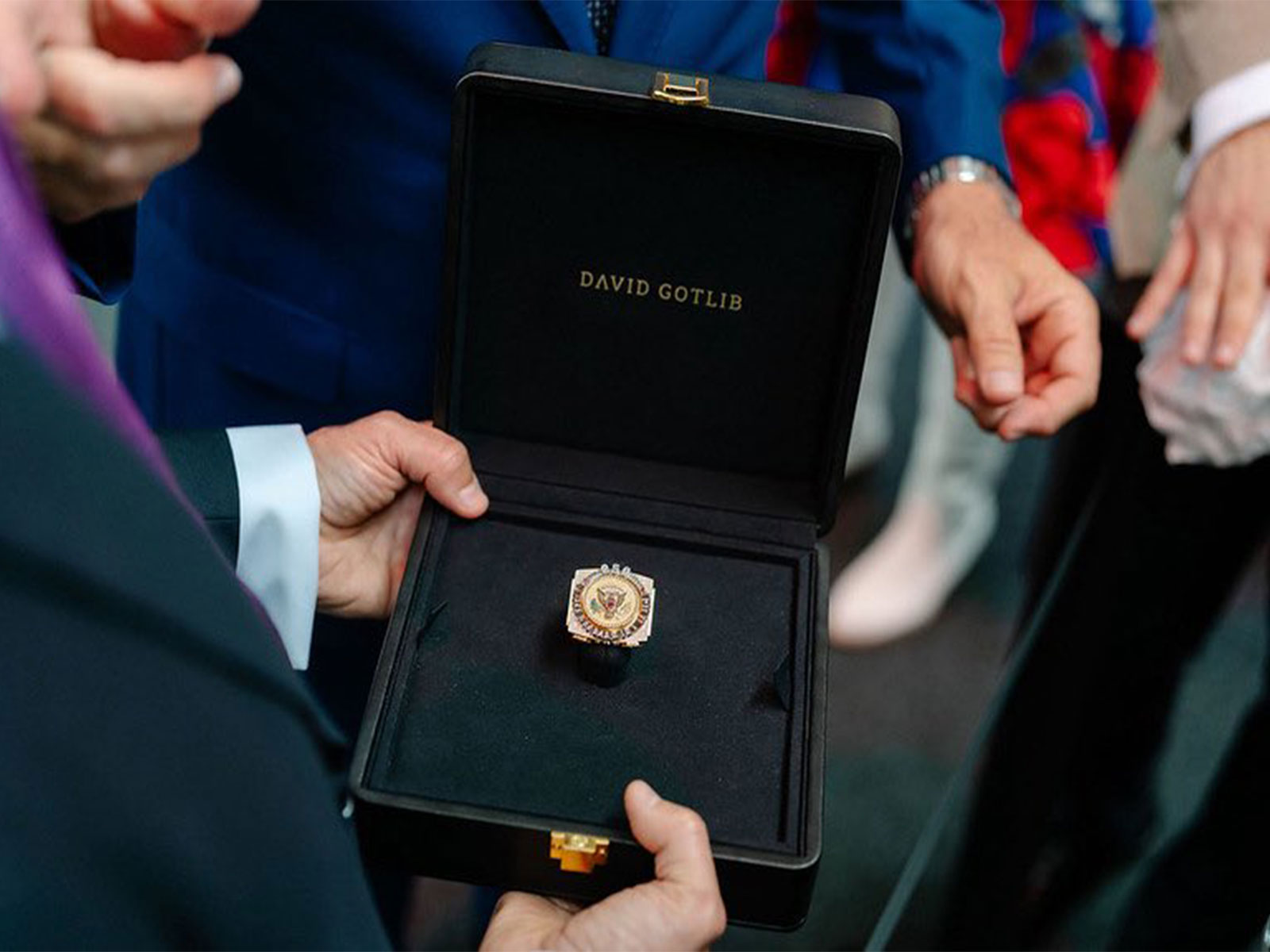 Freedom 250 watch-sized gold ring presented to US Envoy to Belgium to gift to US President Donald Trump (Photo/X/@USAmbToBelgium)