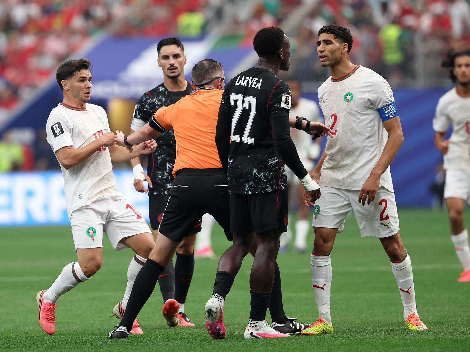 Soccer Football - FIFA World Cup 2026 - Round of 16 - Canada v Morocco - Houston Stadium, Houston, Texas, U.S. - July 4, 2026 Morocco's Achraf Hakimi clashes with Canada's Richie Laryea. (Photo: Reuters)