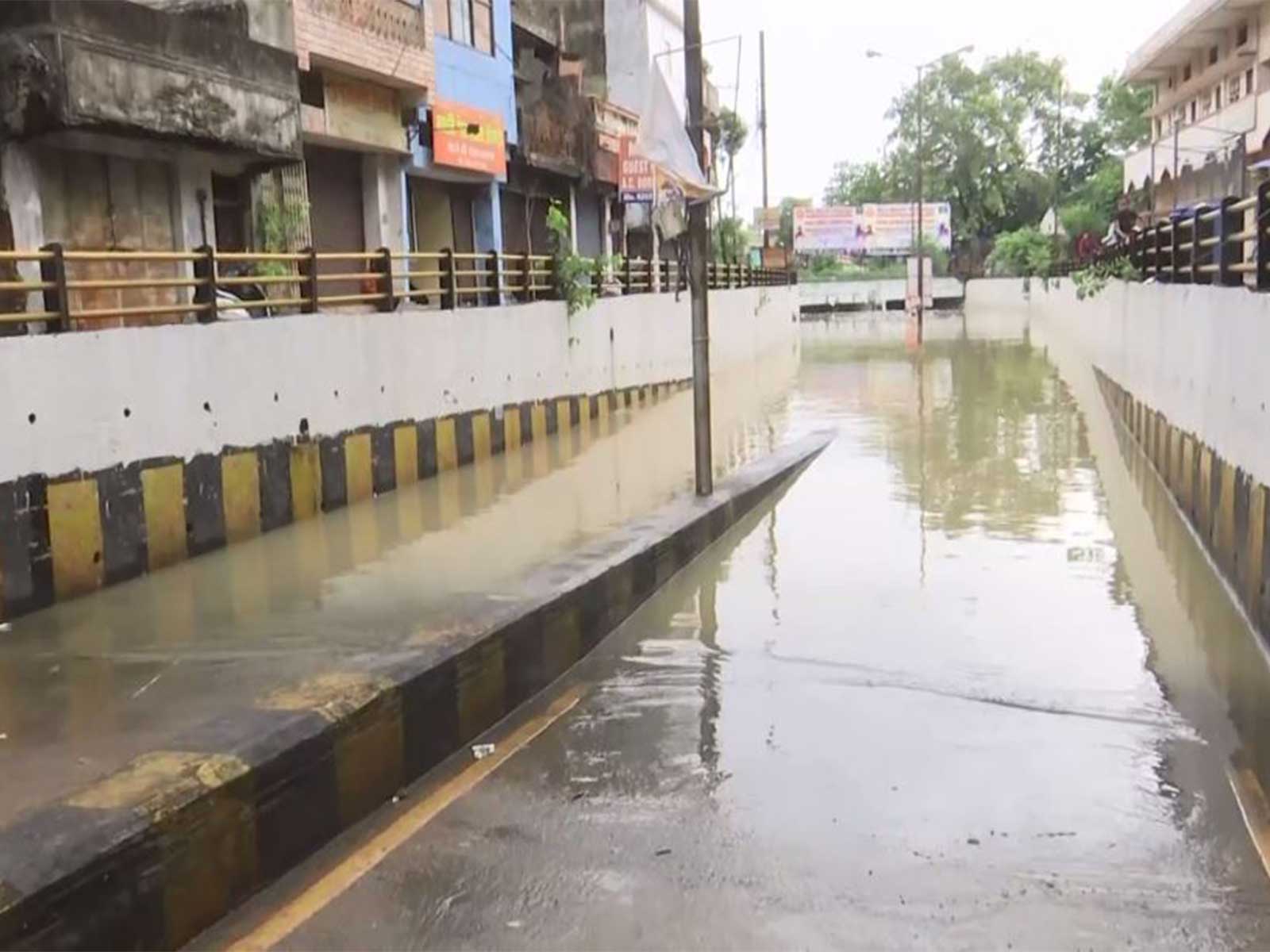 Waterlogging at Gudhiyari underbridge following rainfall (Photo/ANI)