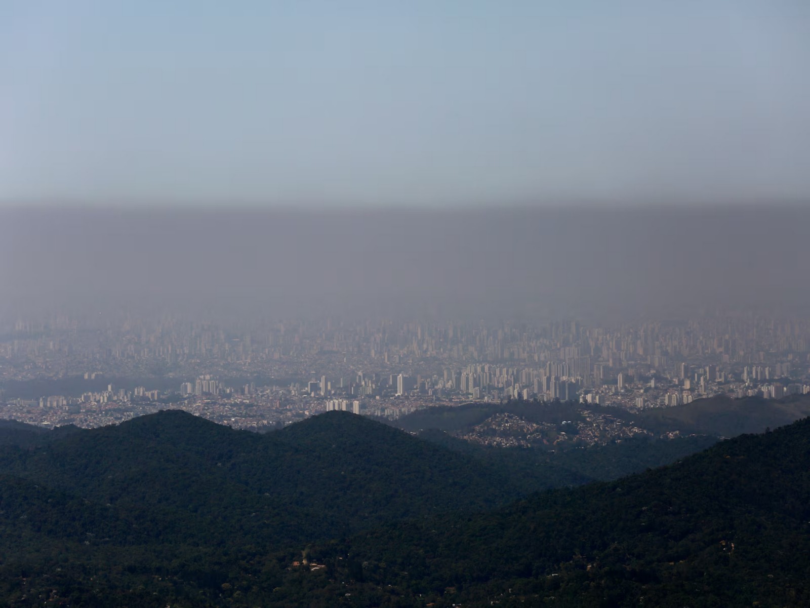 Buildings in São Paulo are shrouded in a thick layer of smog during one of the city's driest seasons in decades. (Photo/Reuters)