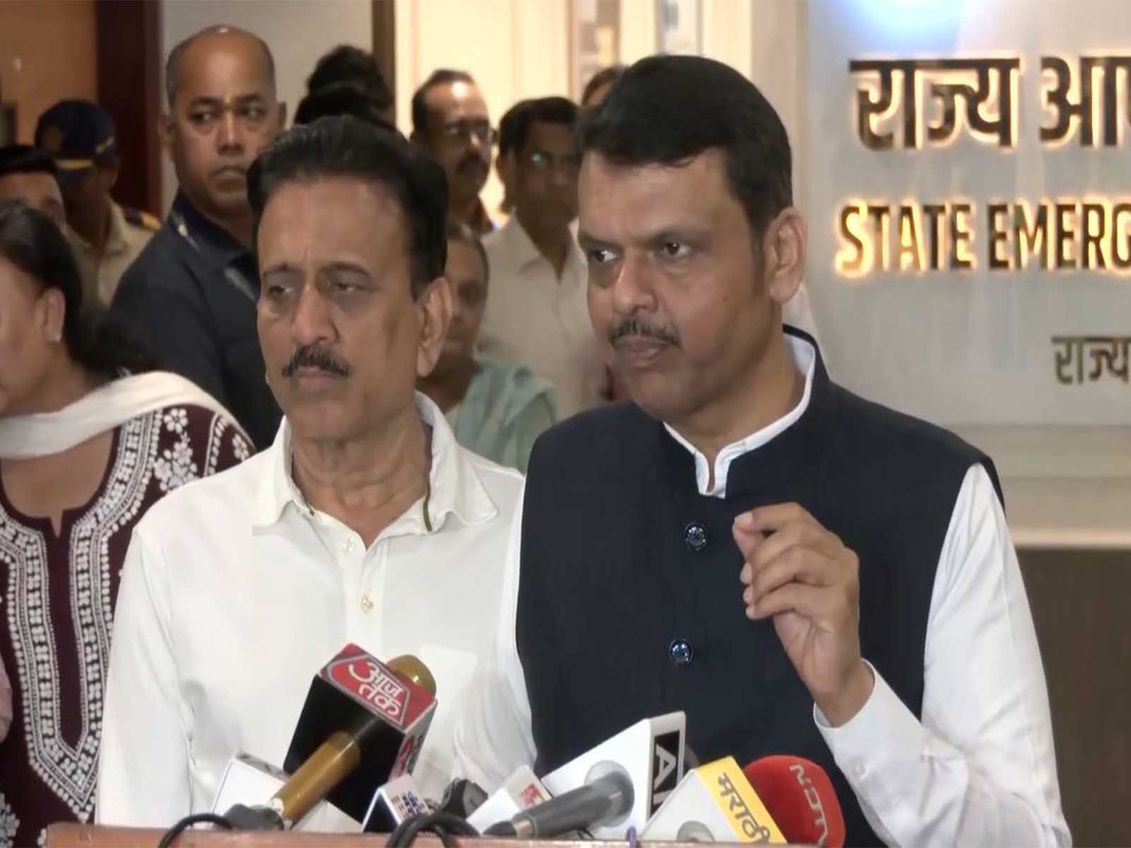 Maharashtra CM Devendra Fadnavis and Disaster Management Minister Girish Mahajan (Photo/ANI)