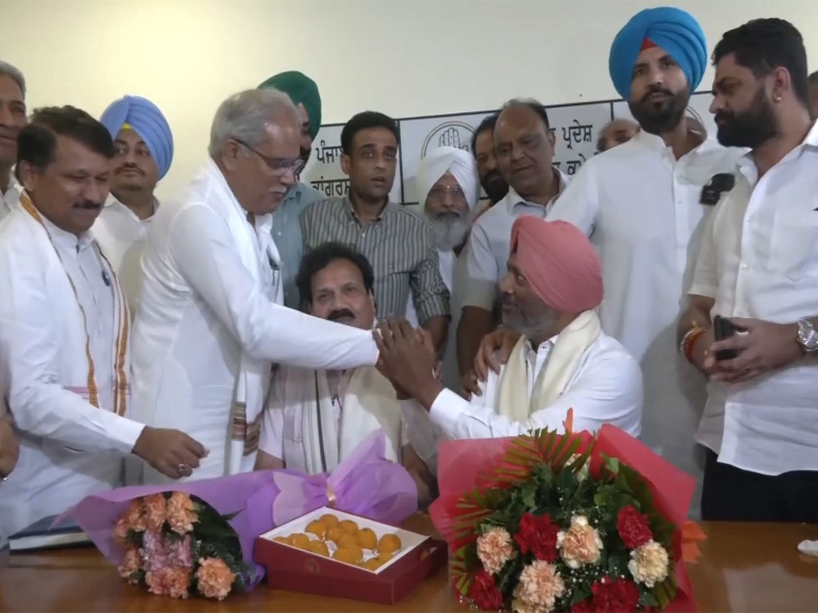 AICC General Secretary in-charge of Punjab Bhupesh Baghel (Second from left) (Photo/ANI)