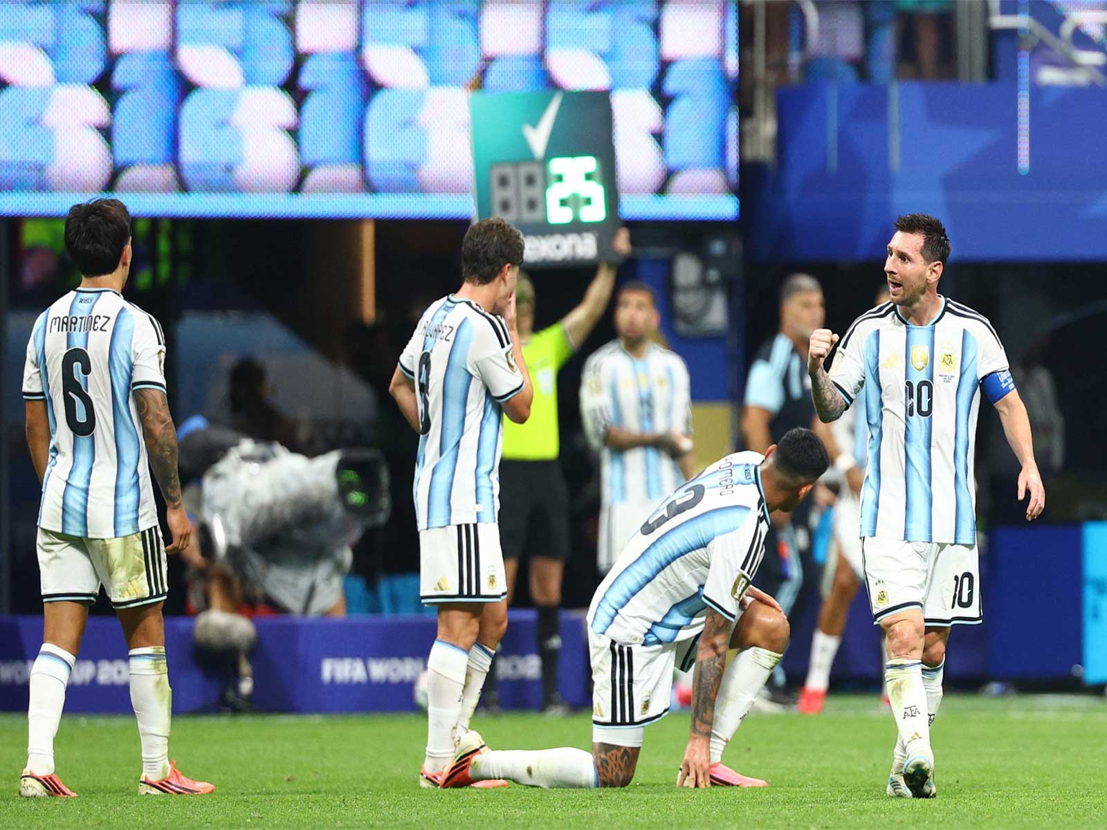 Argentina's Lionel Messi celebrating with teammates. (Photo: IMAGN IMAGES via Reuters)