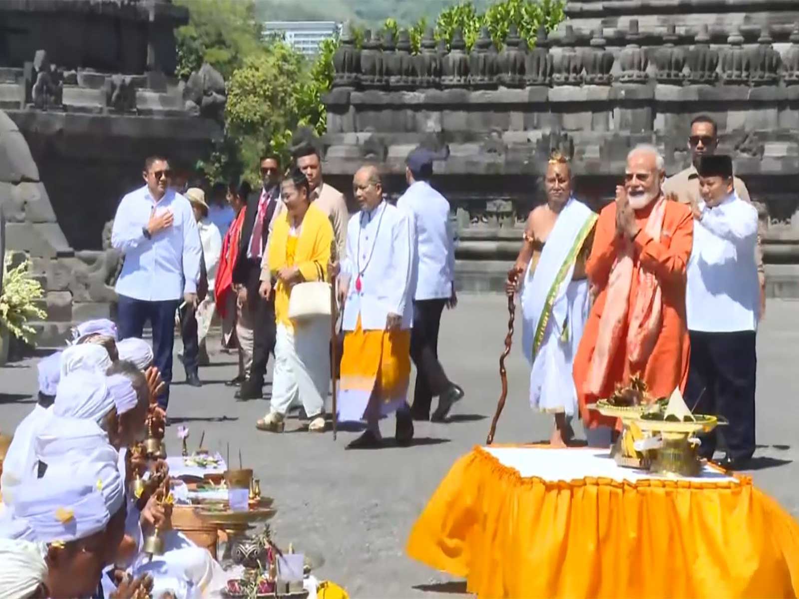 Prime Minister Narendra Modi witnesses prayers by devotees and offers his respects at the historic UNESCO World Heritage Prambanan Temple during his visit to Yogyakarta, Indonesia. (Photo: ANI/DD News)