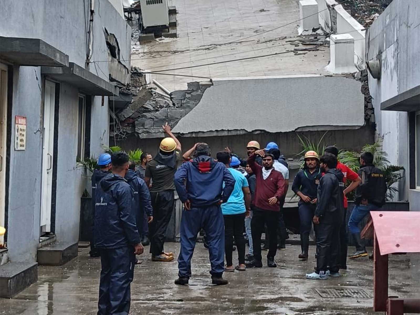 Rescue personnel at the site after a building collapsed in Maharashtra's Pimpri Chinchwad on Wednesday. (Photo/ANI)