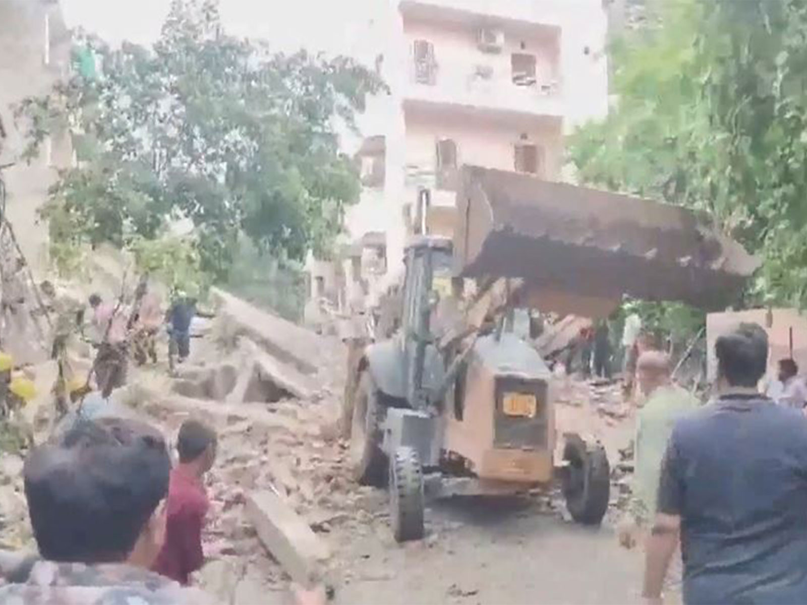 Visuals from the spot after an under- construction building collapsed in Delhi's Rohini Sector 16.(Photo/ANI)