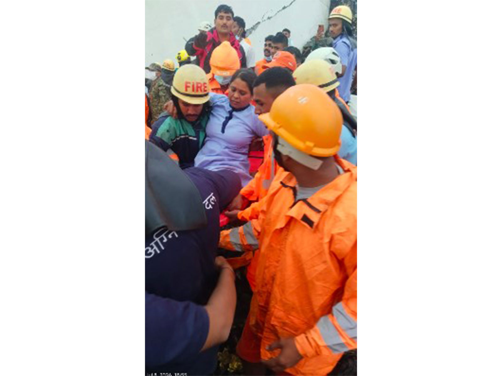 Rescue personal after a building collapsed in Pimpri chinchwad. (Photo/ANI)