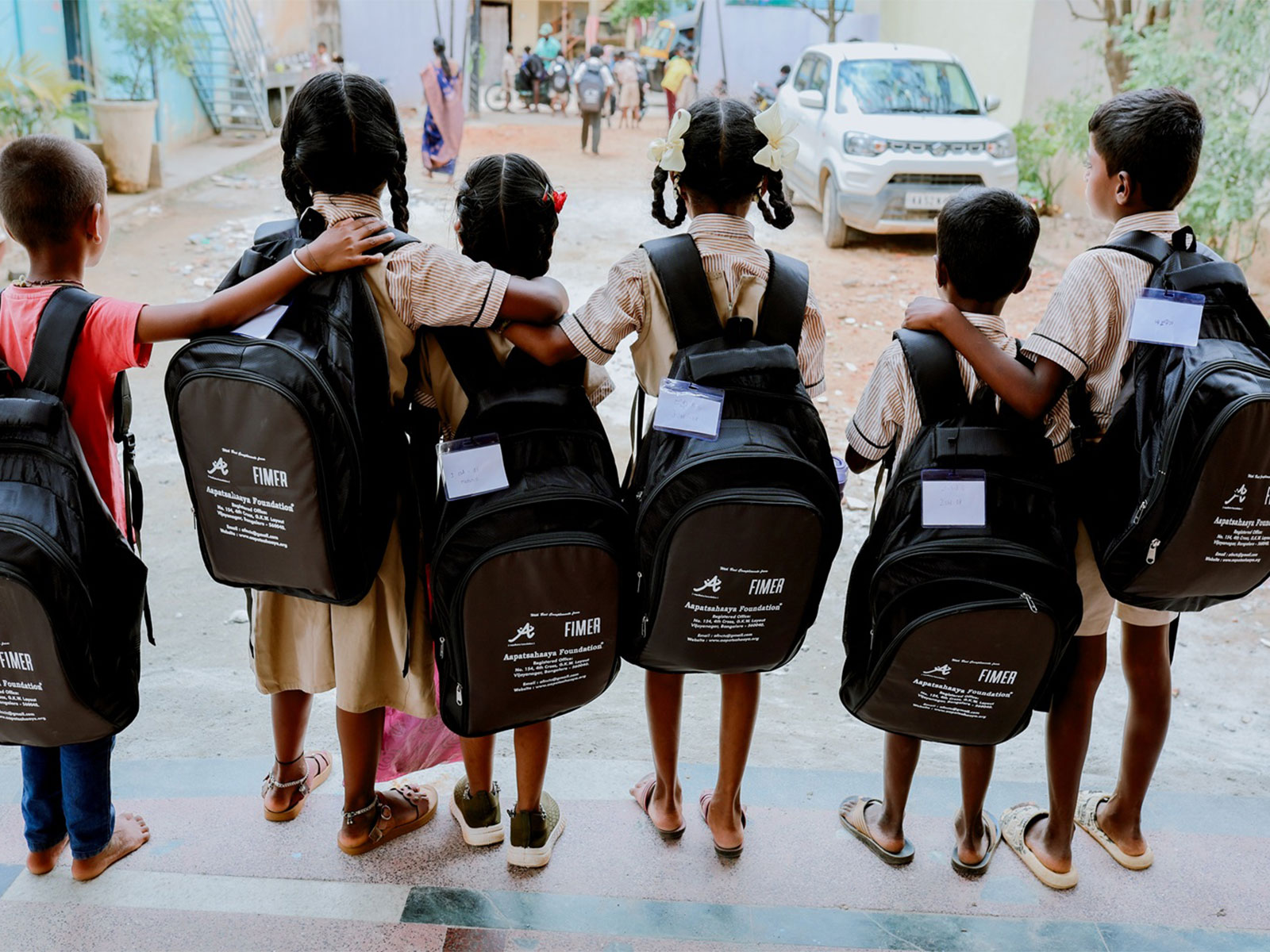 School Kit Distribution by FIMER India as part of its CSR initiative with Aapat-Sahaaya Foundation.