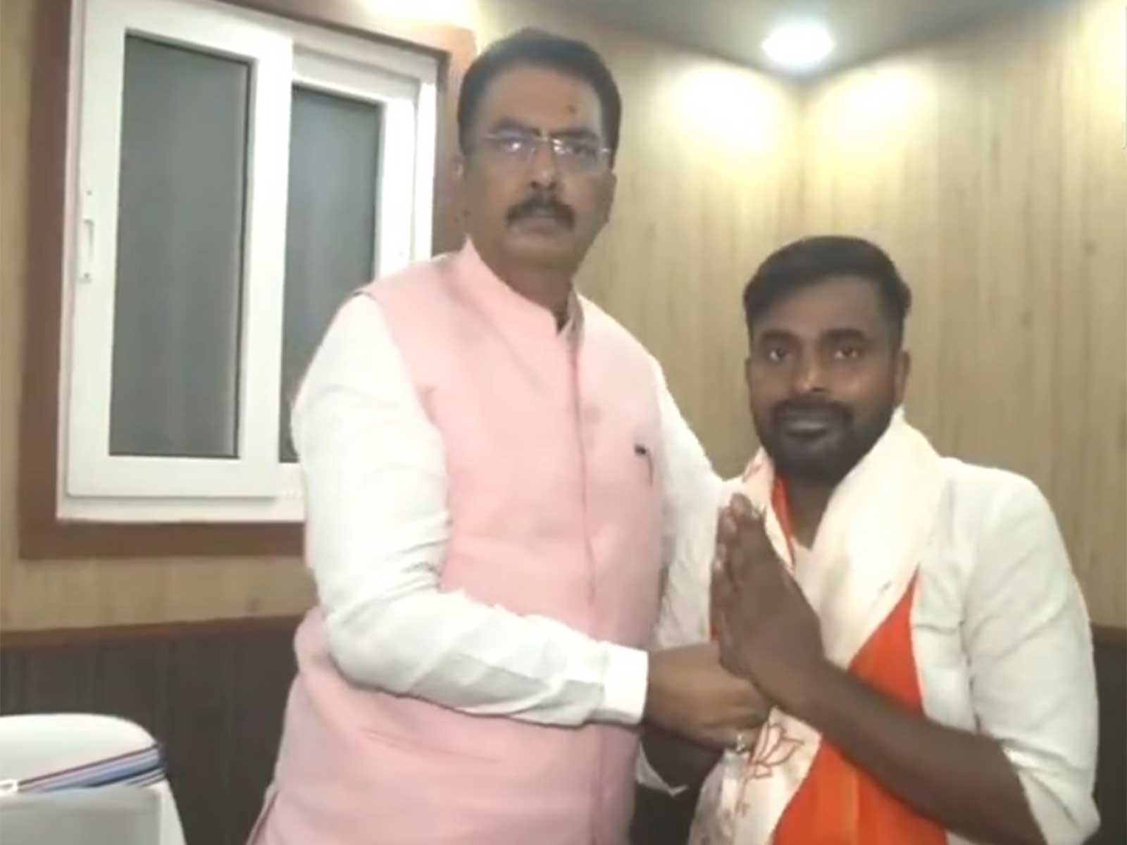 Bihar BJP chief Sanjay Sarogi felicitates party's candidate from Bankipur Assembly seat, Neeraj Kumar Sinha (Photo/ANI)