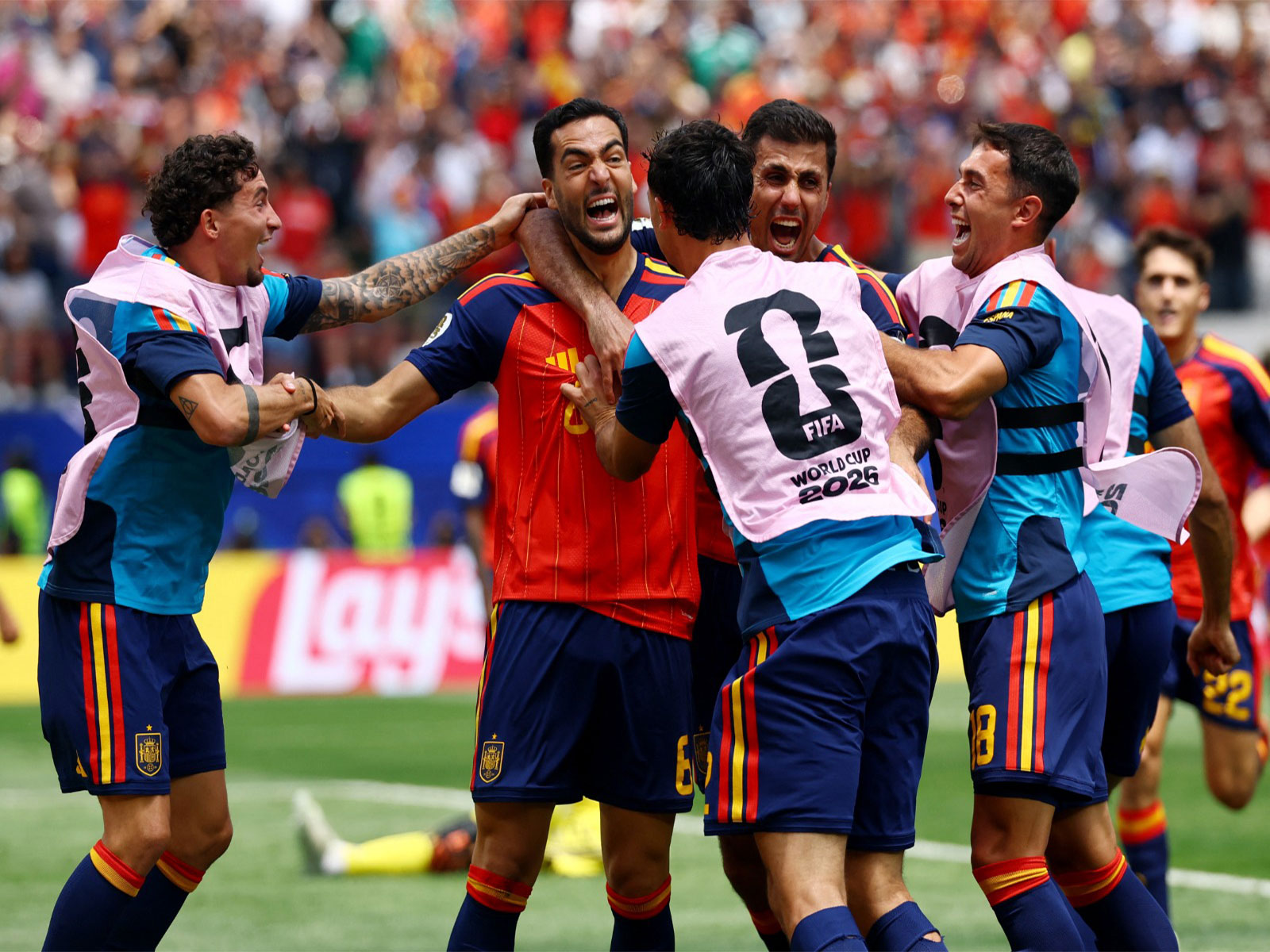 Spain's Mikel Merino celebrates scoring their second goal with teammates against Belgium (Photo: Reuters)