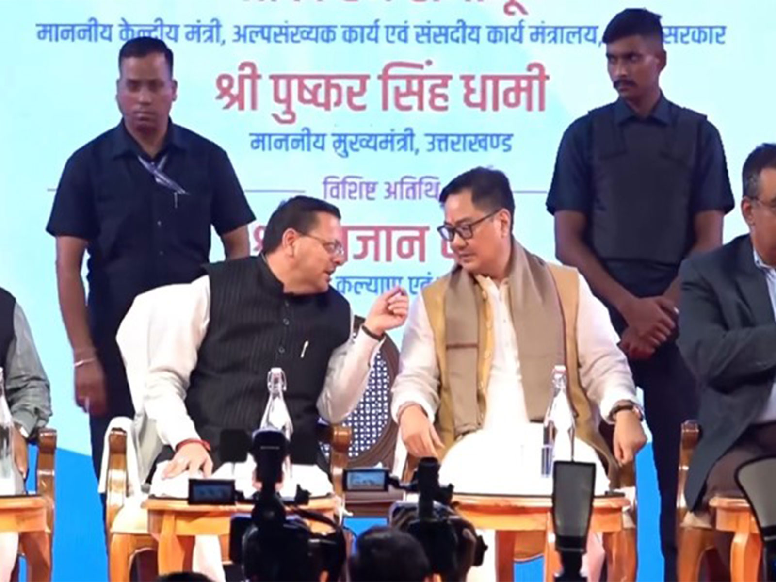 Uttarakhand Chief Minister Pushkar Singh Dhami, along with Union Minister for Minority Affairs Kiren Rijiju at an event. (Photo/ANI)