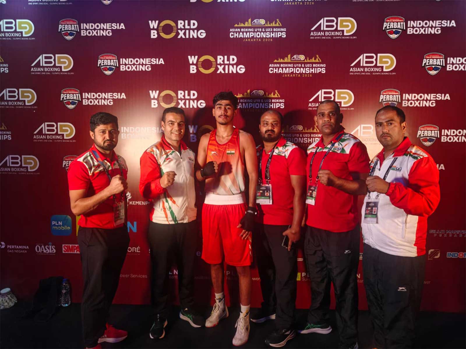 Mausam (U-19) celebrates  his QF win with coaches at Asian U-19 & U-23 Boxing Chamipionship 2026. (Photo/BFI)
