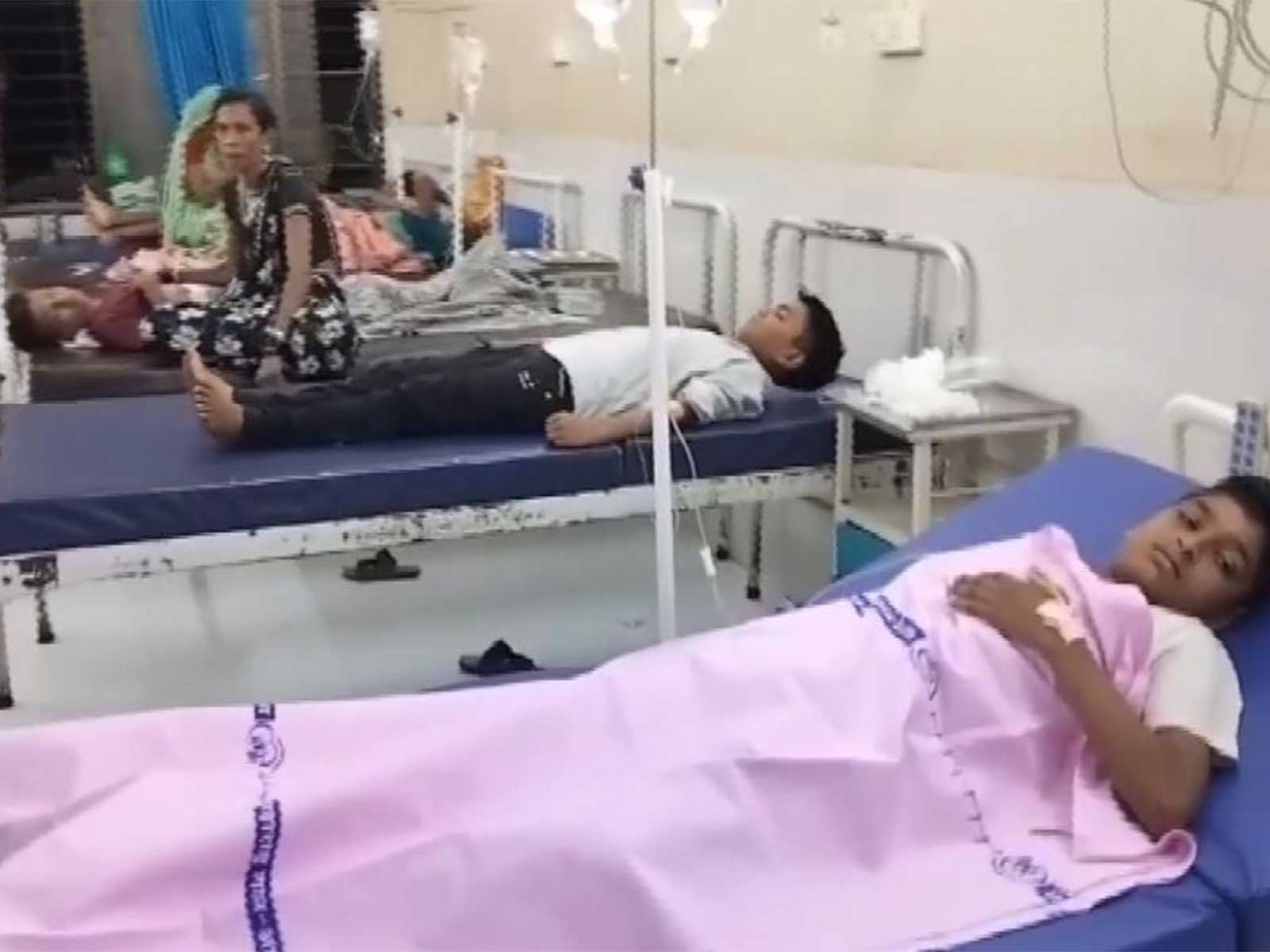 Students of a Social Welfare Department hostel undergo treatment at a hospital after falling ill in Shahada, Nandurbar (Photo/ANI)