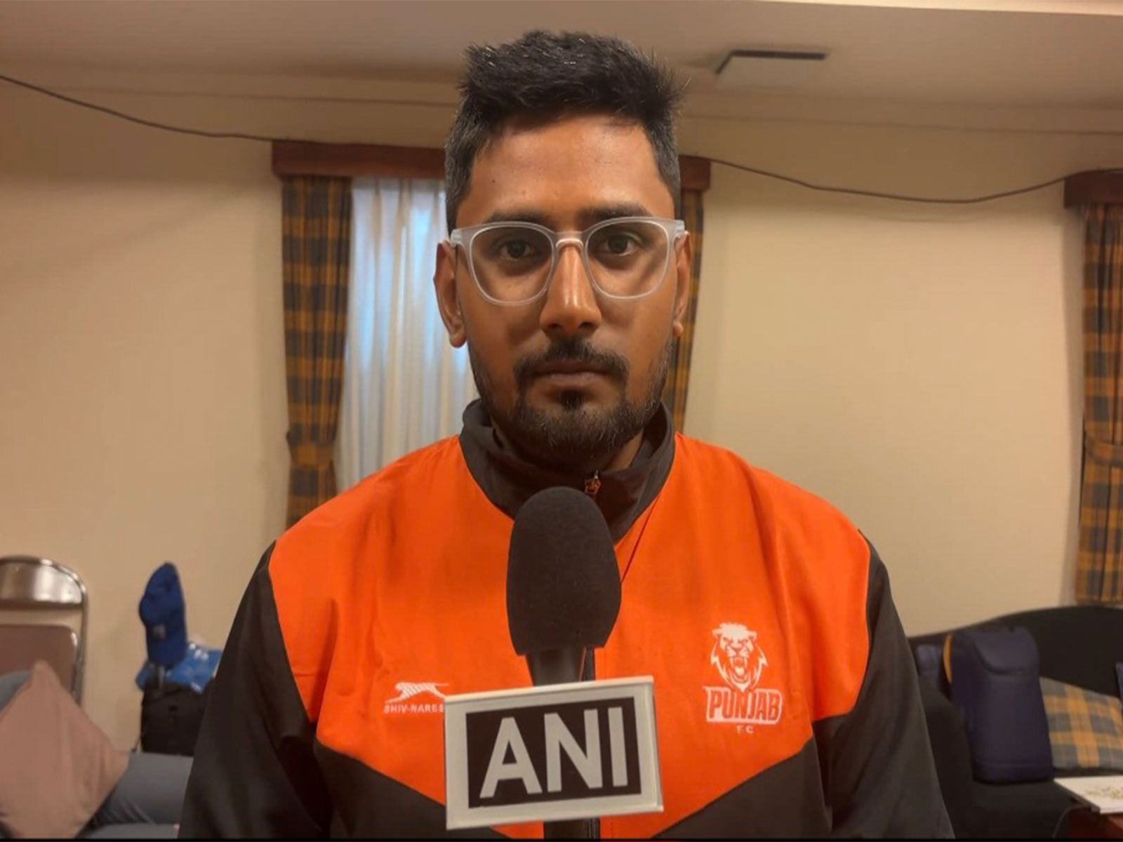 Punjab FC youth coach Praveen Kumar. (Photo: ANI)