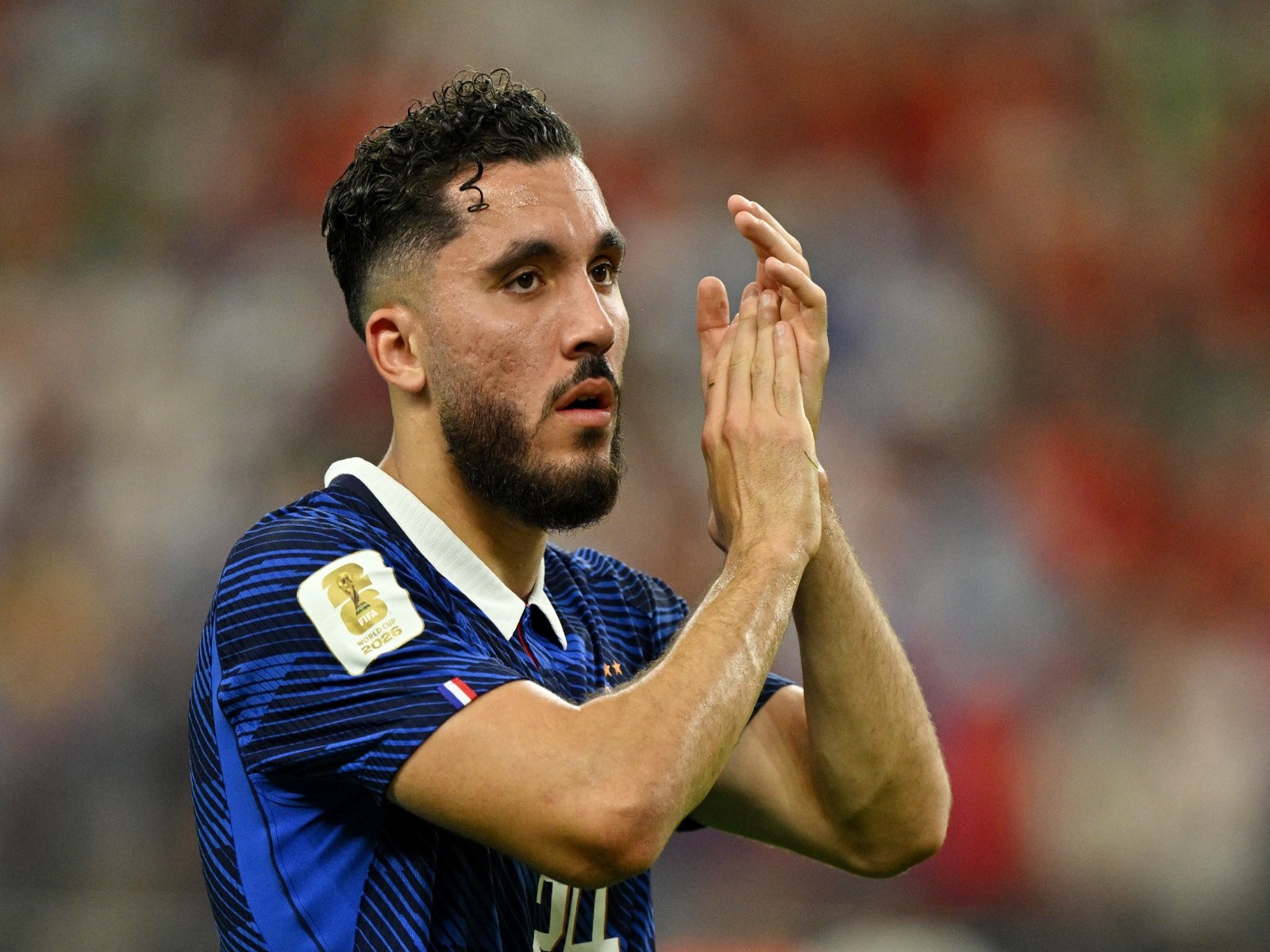 France's Rayan Cherki looks dejected after the semifinal against Spain as France are eliminated from the World Cup. (Photo: IMAGN IMAGES via Reuters)