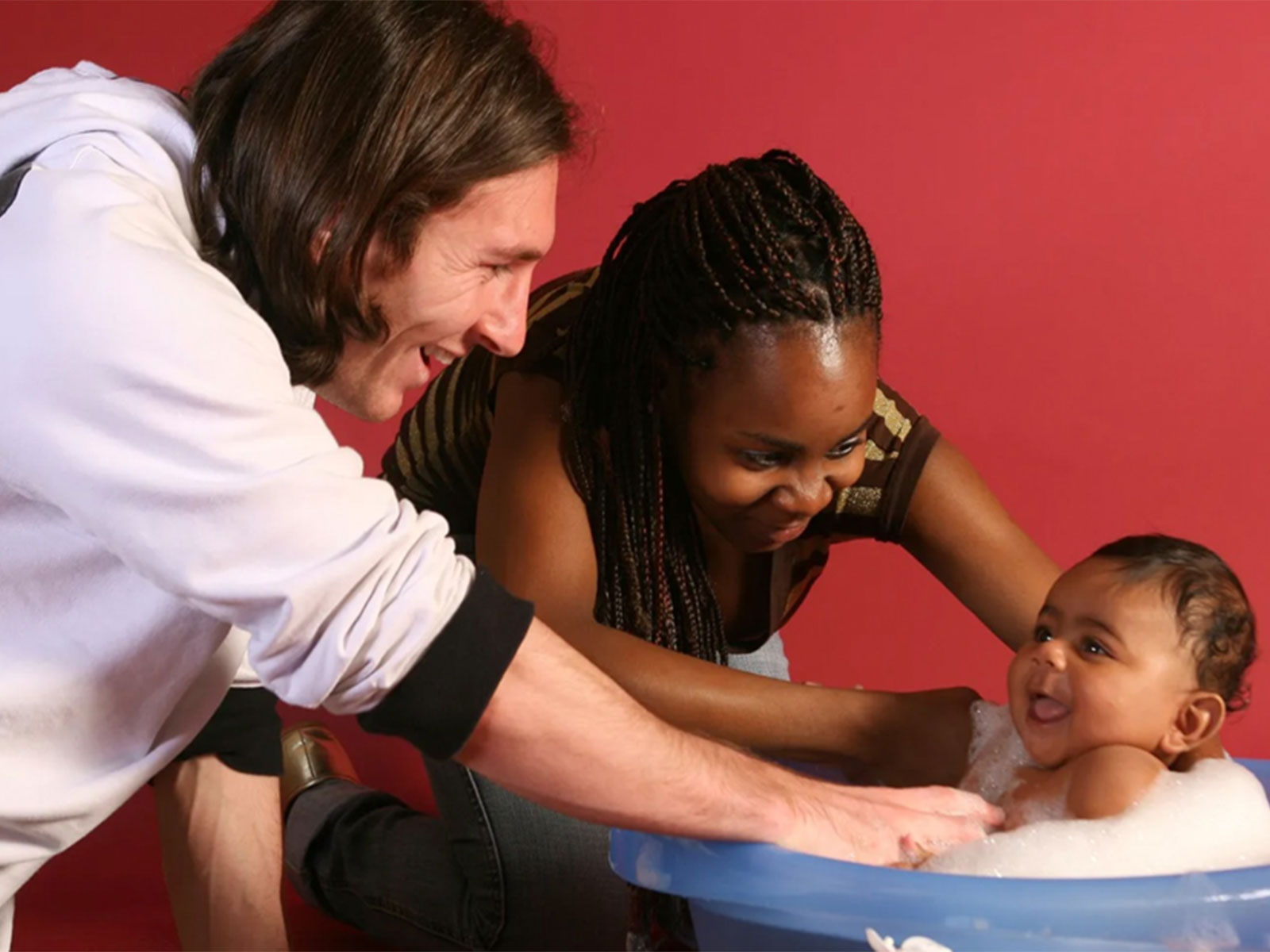 Lionel Messi interacts with baby Lamine Yamal during a UNICEF fundraising photoshoot organised by the Barcelona Foundation in 2008. (Photo Credits: Joan Monfort via UNICEF)