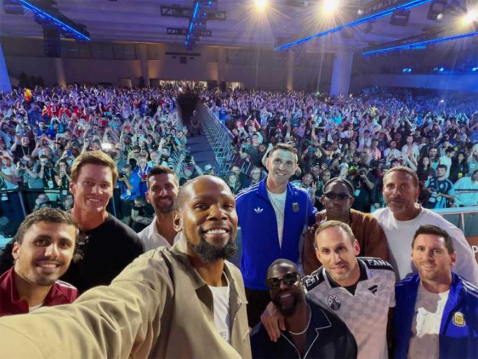 Kevin Durant takes a selfie with Lionel Messi, Tom Brady, Novak Djokovic, Kevin Hart, Emiliano Martinez, Fanatics CEO Michael Rubin, Travis Scott,Rio Ferdinand and Rodri during Fanatics Fest 2026. (Photo: Instagram/Michael Rubin)
