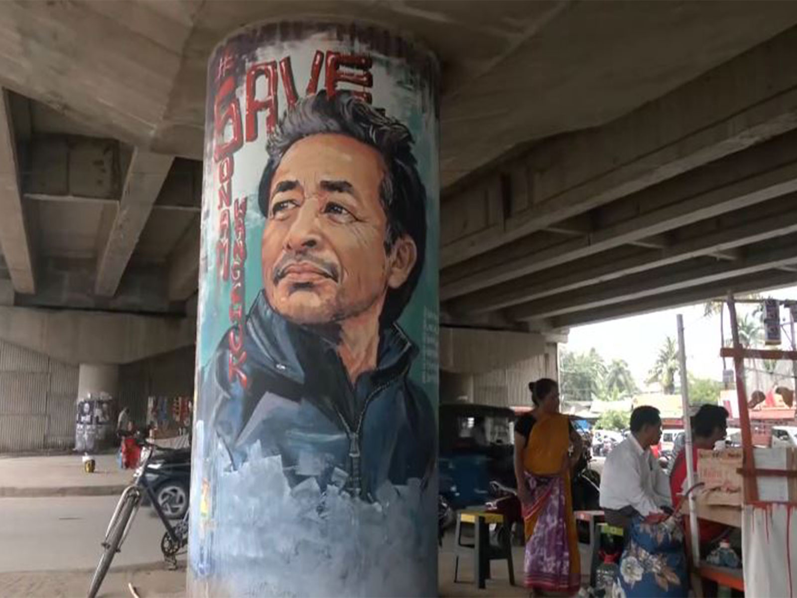 Murals of activist Sonam Wangchuk seen on public walls in Guwahati. (Photo/ANI)